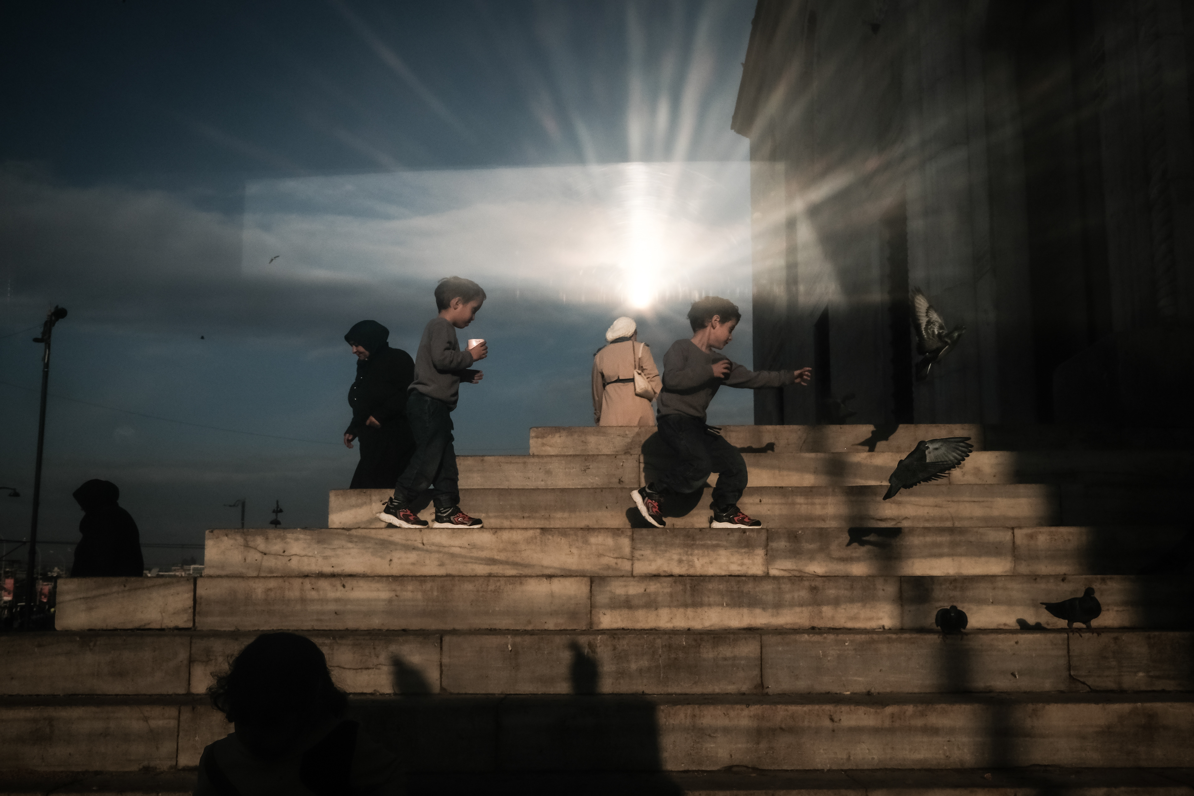 JUXTANBUL CANDID - Taken in Eminonu/Istanbul - new mosque - reflection - pigeons- juxtaposition