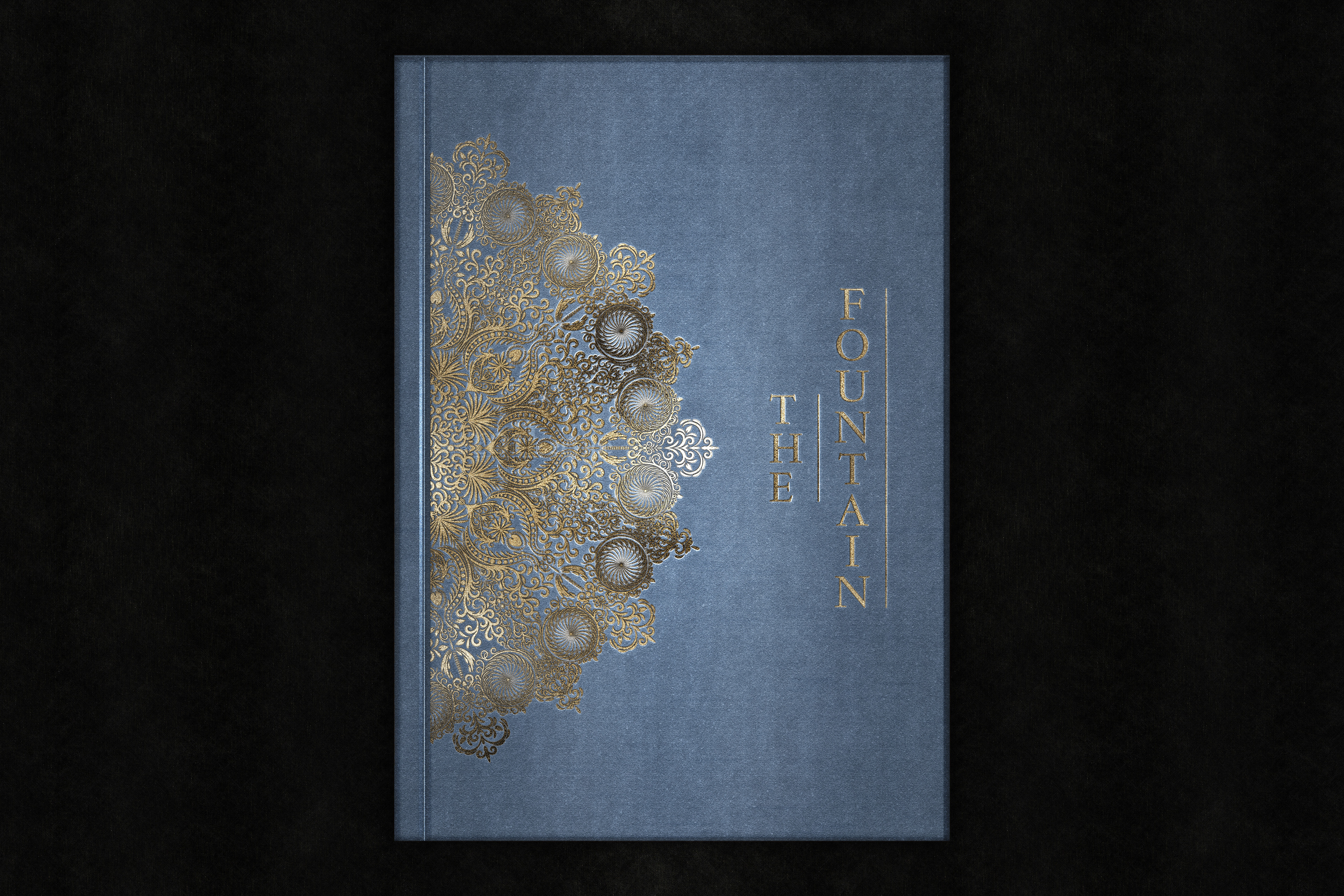 Digital blue book cover with gold foil debossed mandala.
