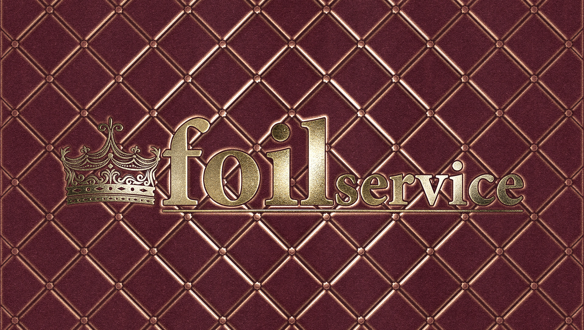 Logotype embossed and debossed with gold foil, on a digital red paper texture.