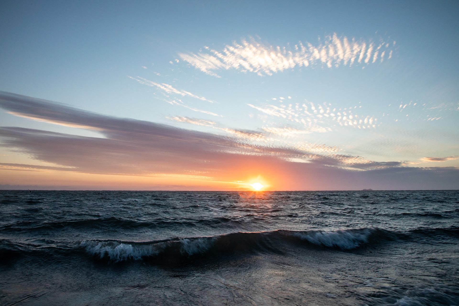 Watching the sun set over the Pacific Ocean in the Pacific Northwest.