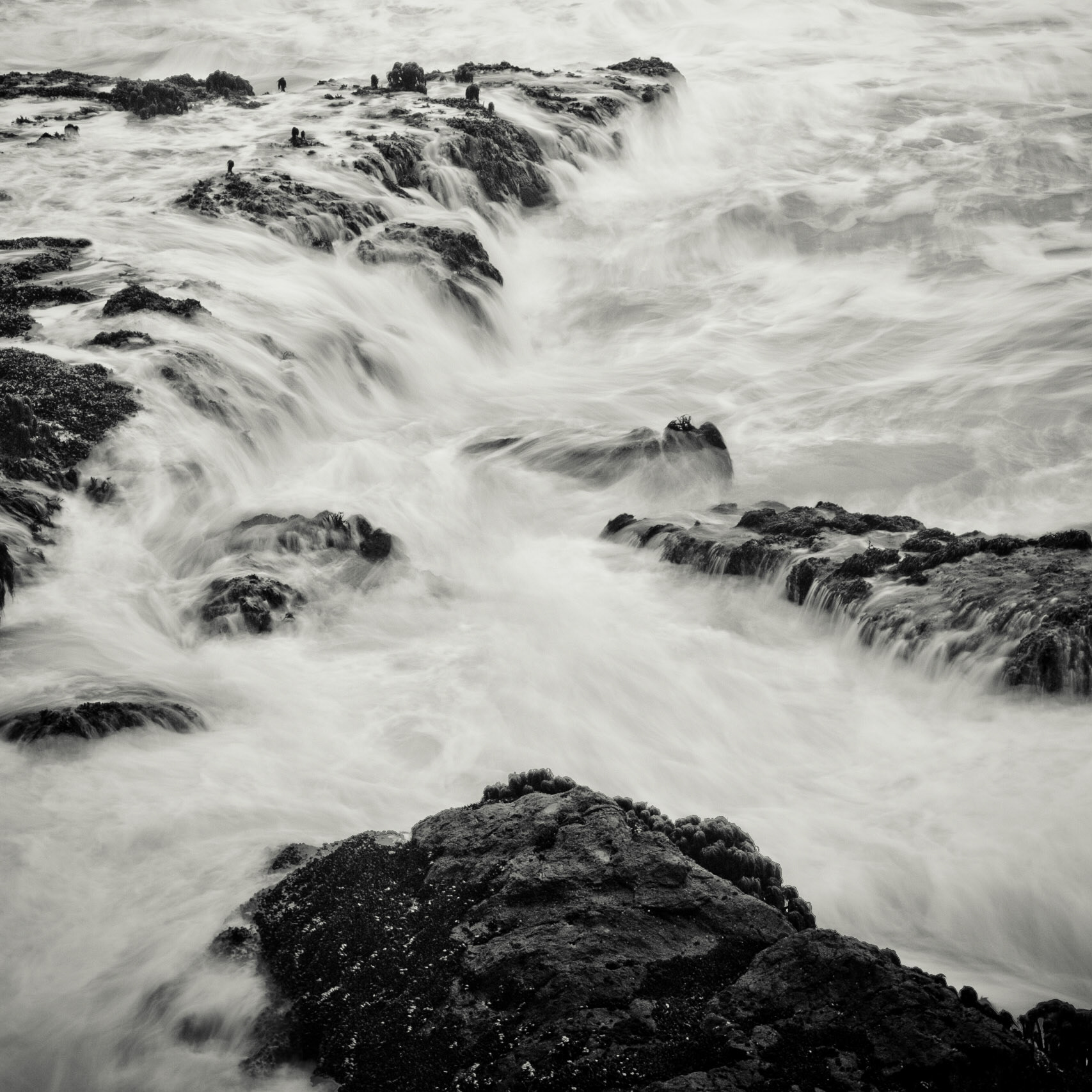 The tide starts to descend on the coast of Trinidad, CA.