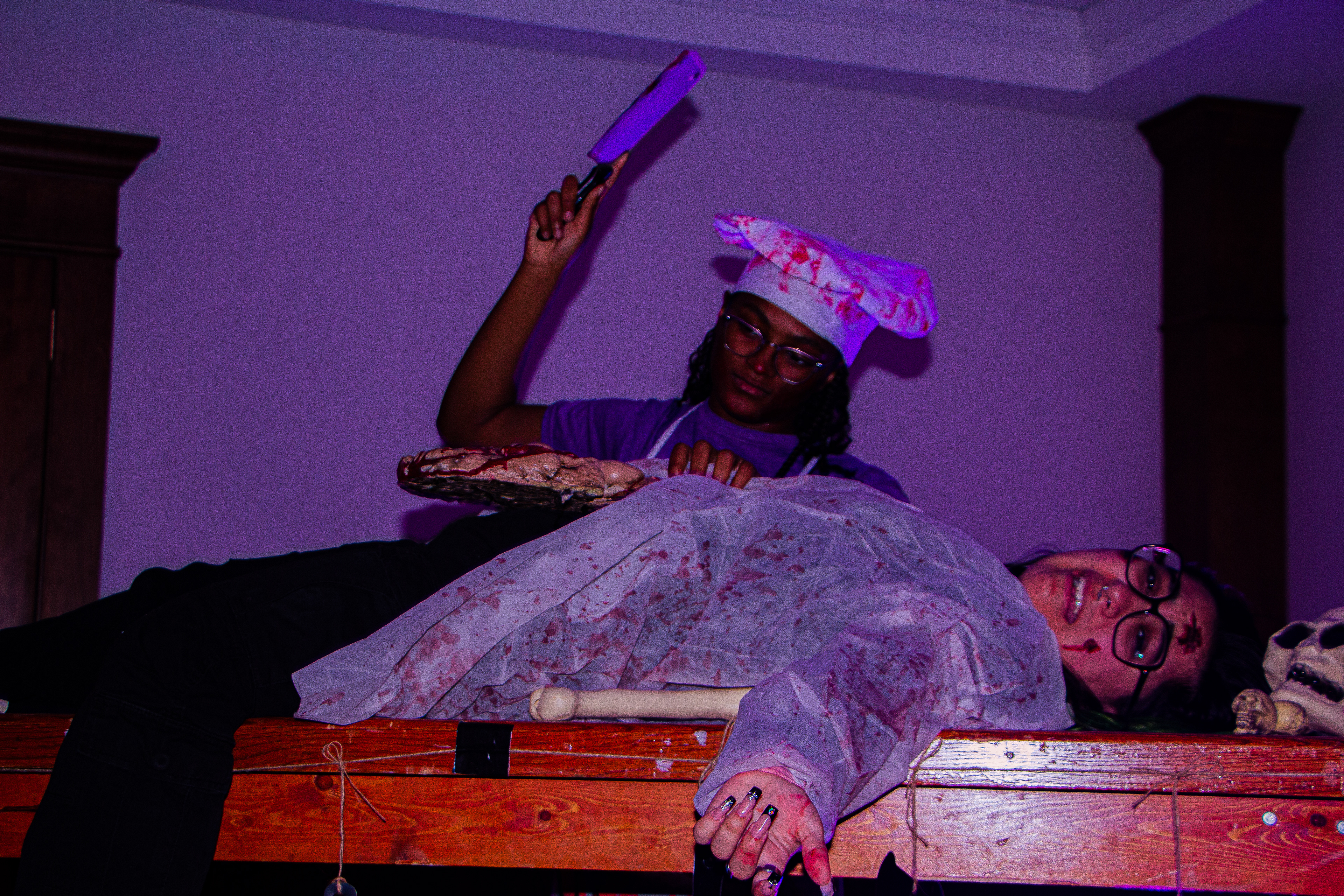 SFA Senior Autumn Menard portrays a deranged chef mutilating a victim portrayed by Andrea Meneses, a freshman animal science major also from Houston.