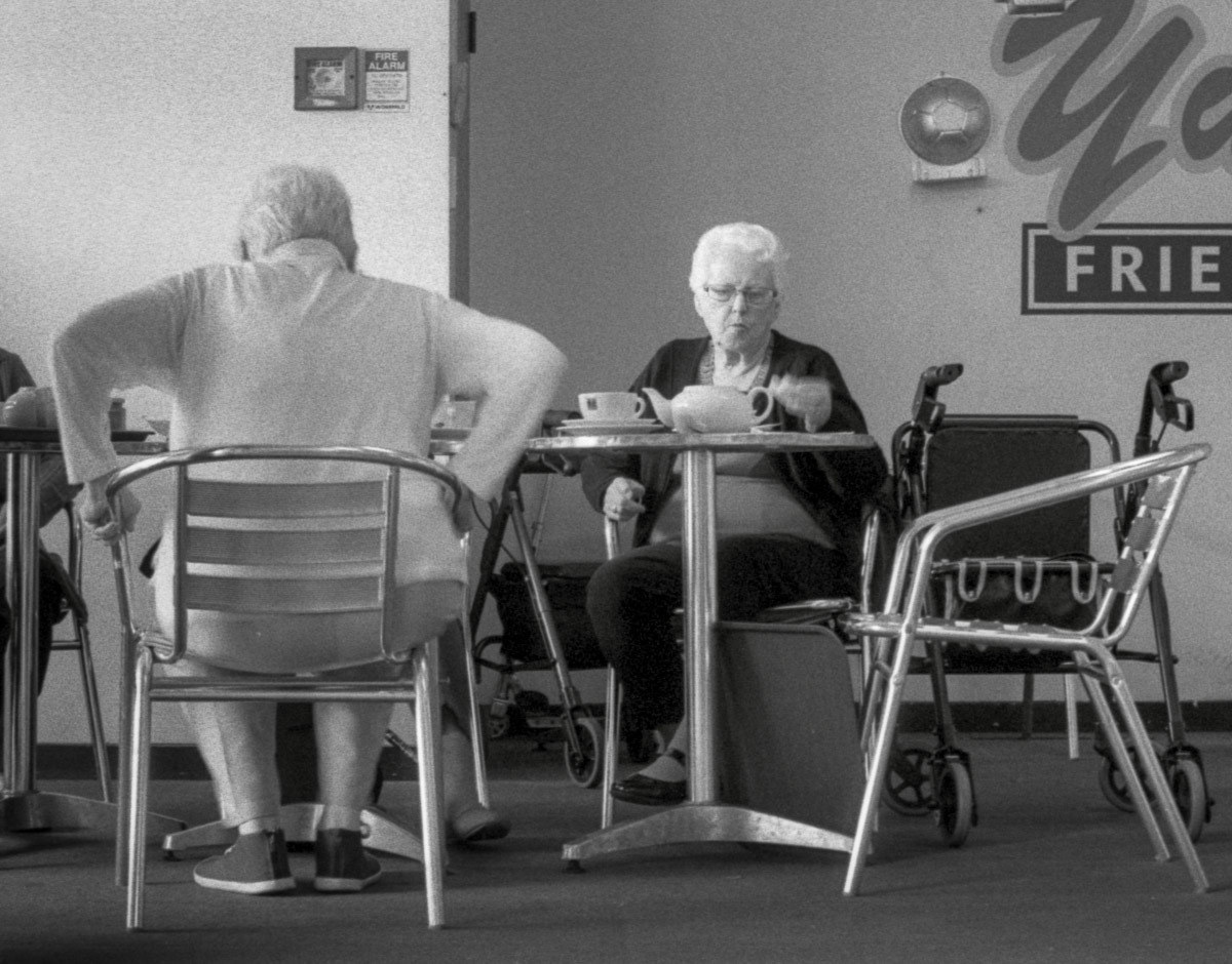 Customers taking tea at a table in Fresh Bun cafe, Upper Hutt, 2016