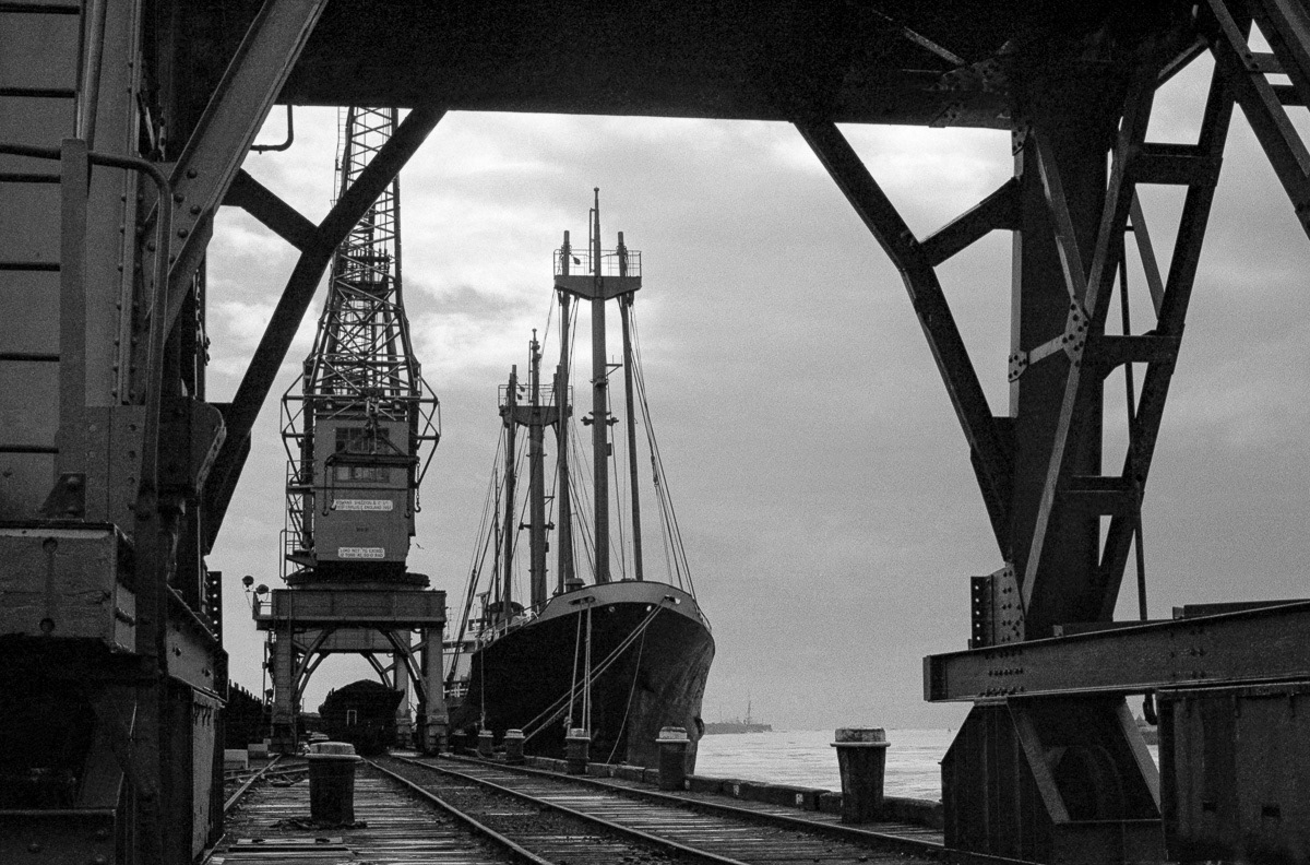 The collier "Titoki" berthed at Greymouth wharf, West Coast