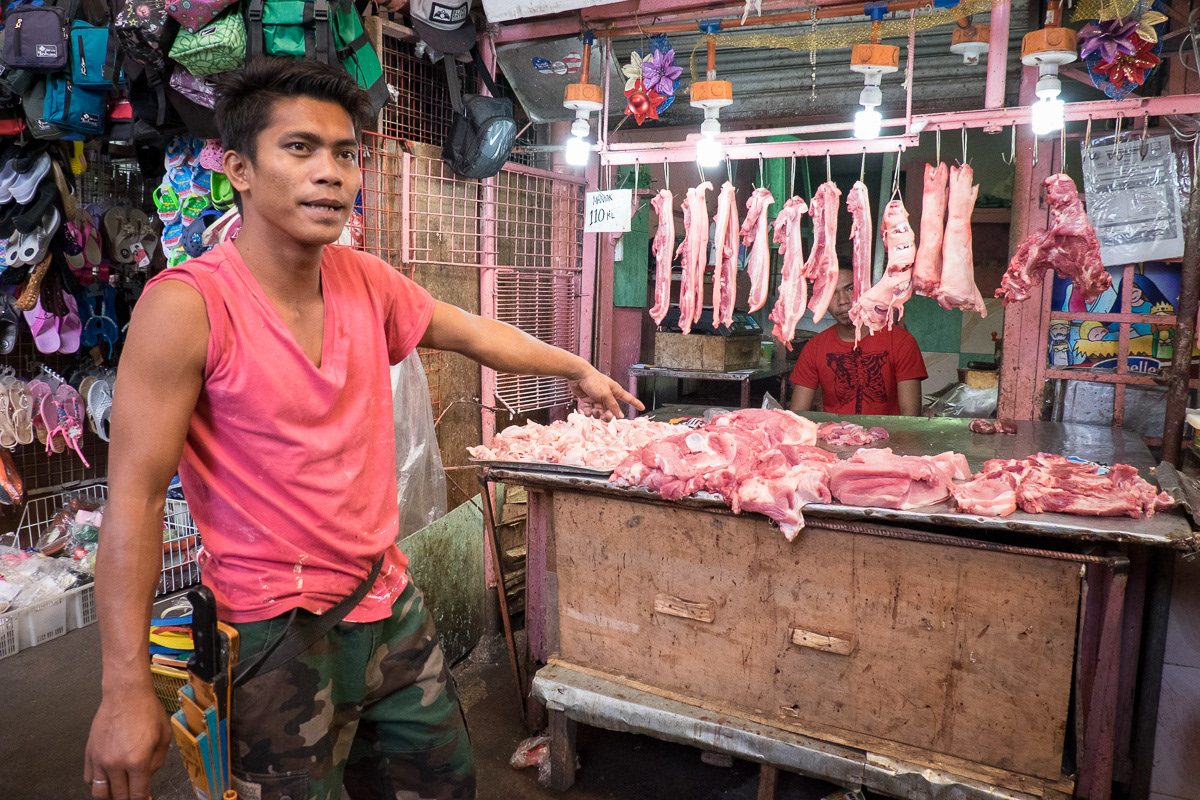 Meat seller at Marikina Markets, Philippines, 2015