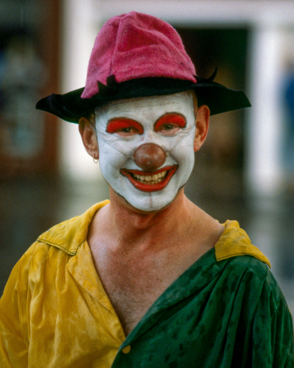 Clown smiling at Mare Gras event at Oriental Bay, Wellington