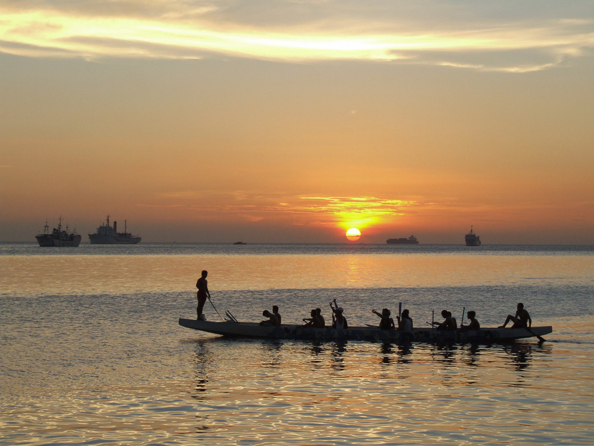 Manila Bay at sunset with boat racing practice, 2005