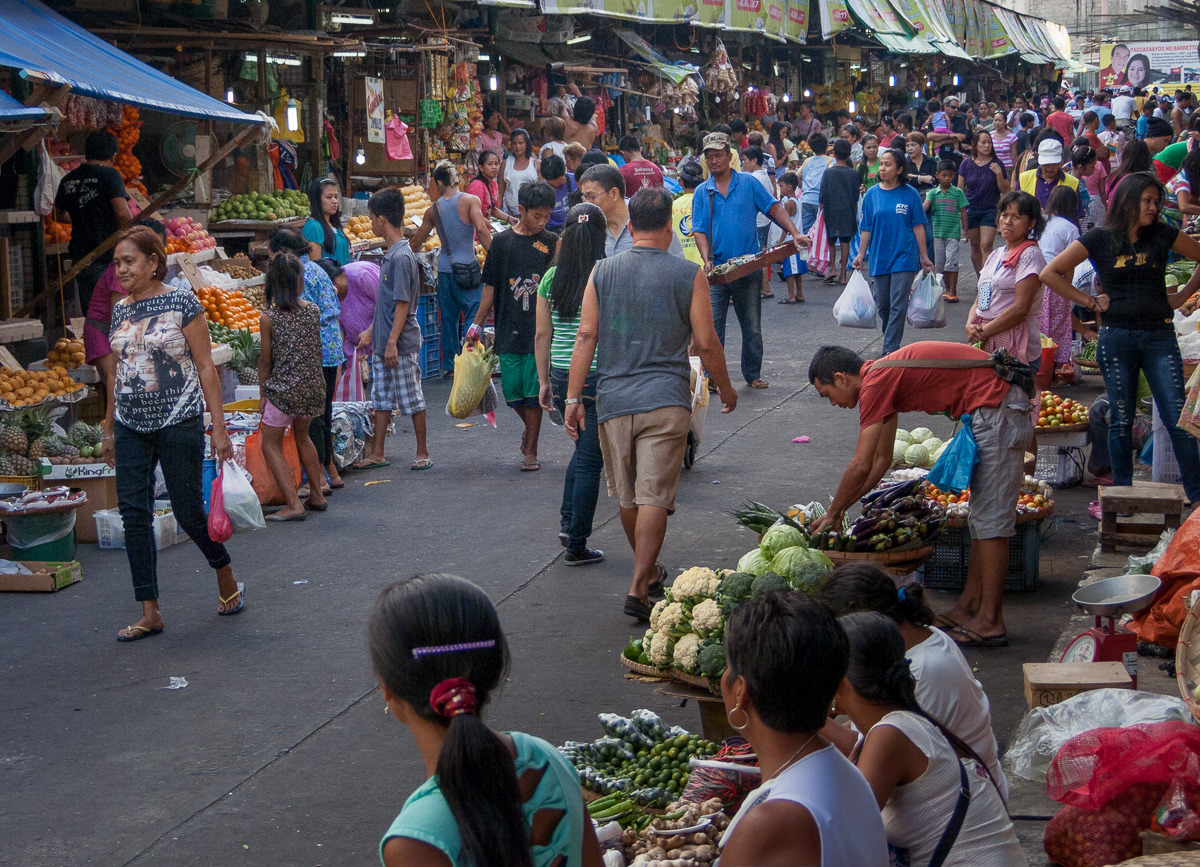 Fruit and vegetable stalls in the Olongapo public market, Philippines, 2013