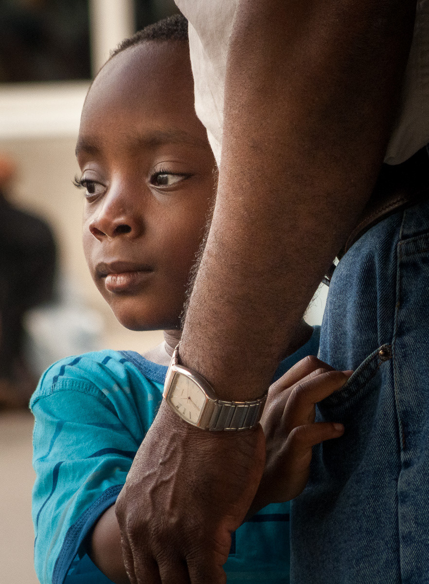 Boy with his father In a shopping mall, Mississauga, 2011