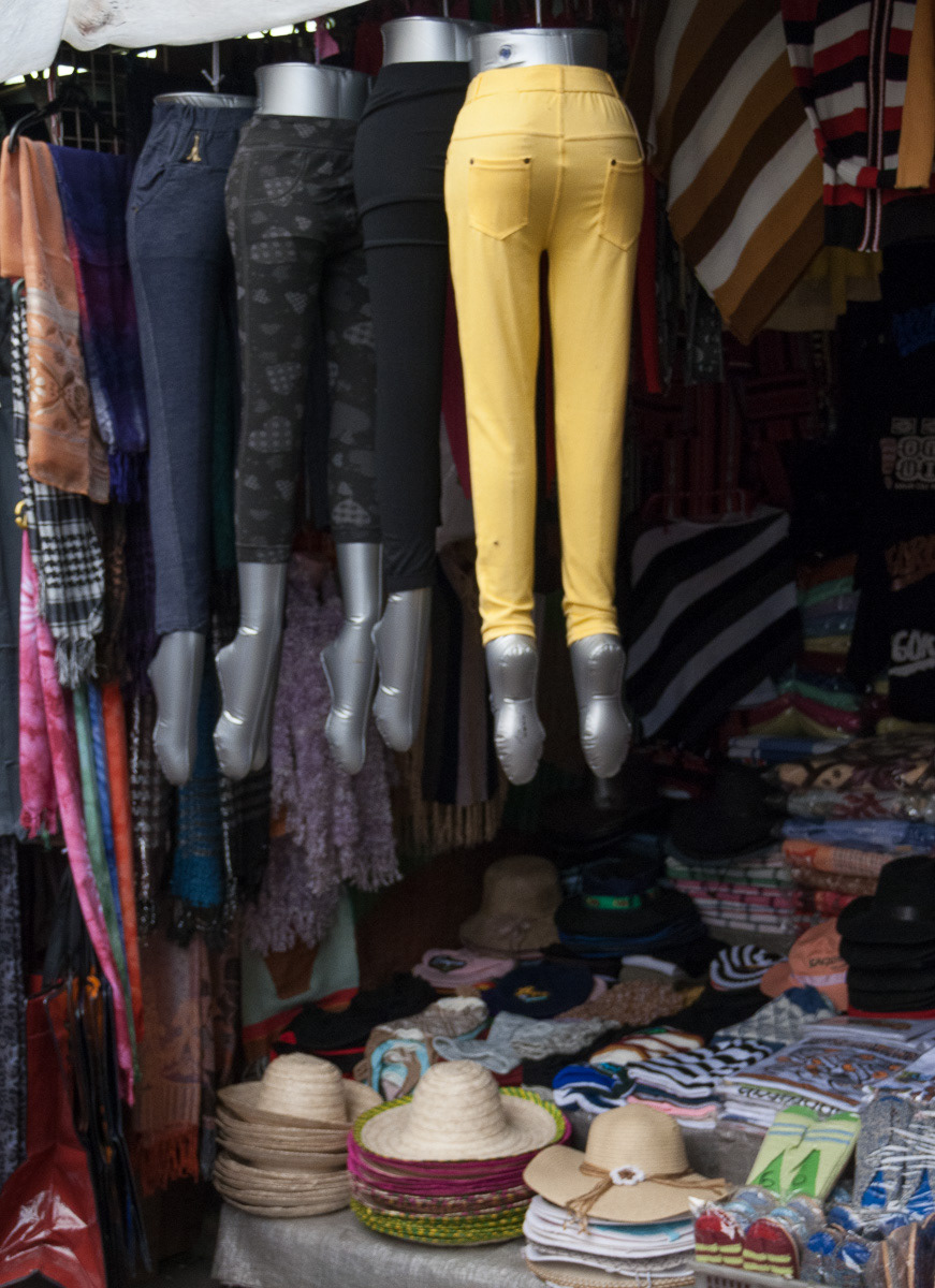Trousers above and hats below, Baguio public markets, Philippines, 2013