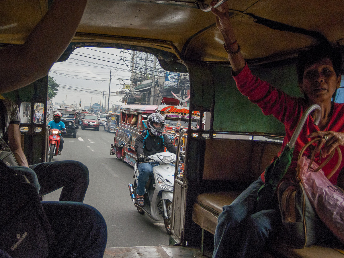 Looking out through rear of a jeepney, Marikina, Philippines, 2013