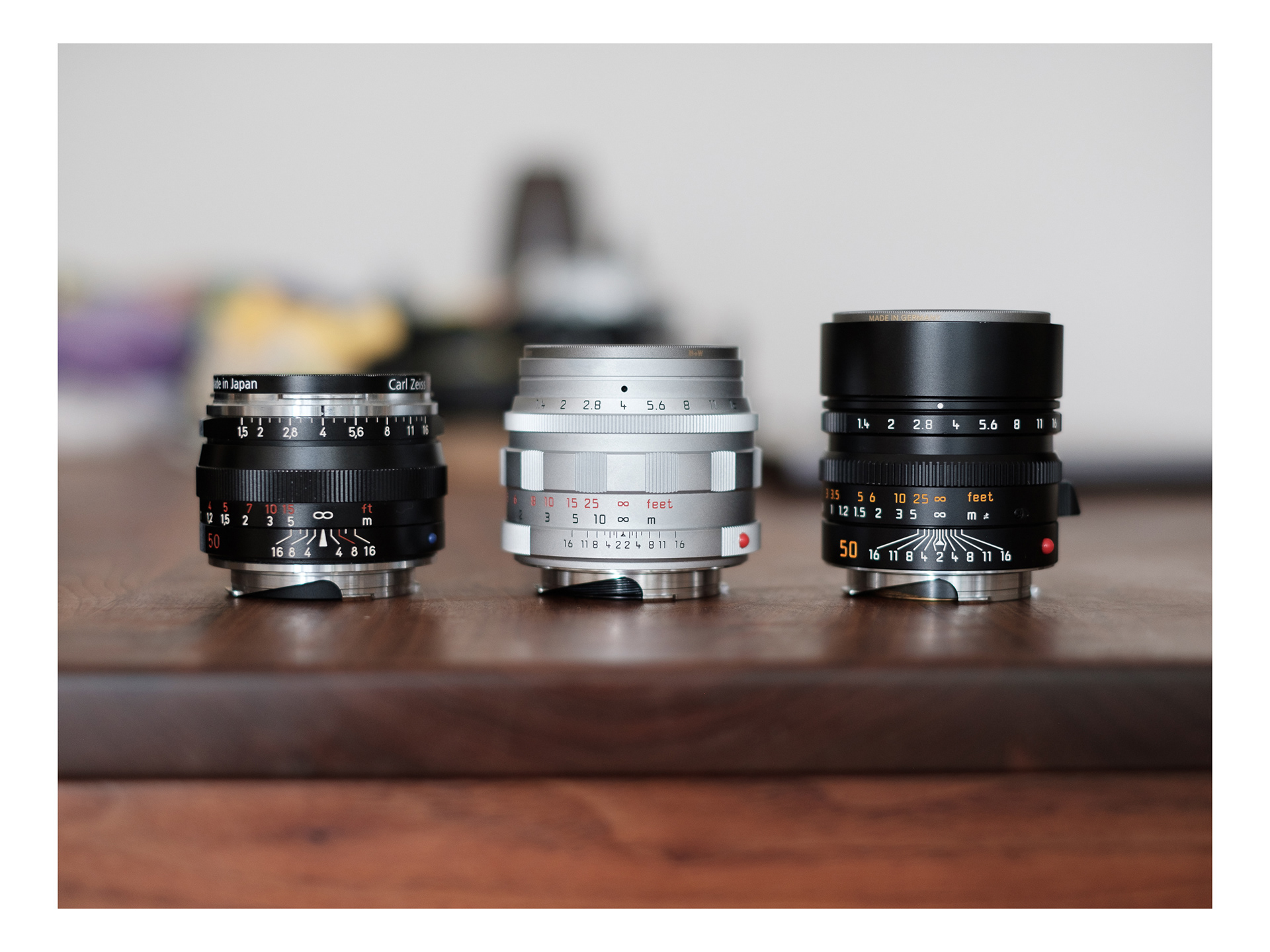 Three 50mm lenses - Zeiss C Sonnar 1.5/50, Leica Summilux-M 1.4/50 Classic reissue, Leica Summilux-M 1.4/50 ASPH v4