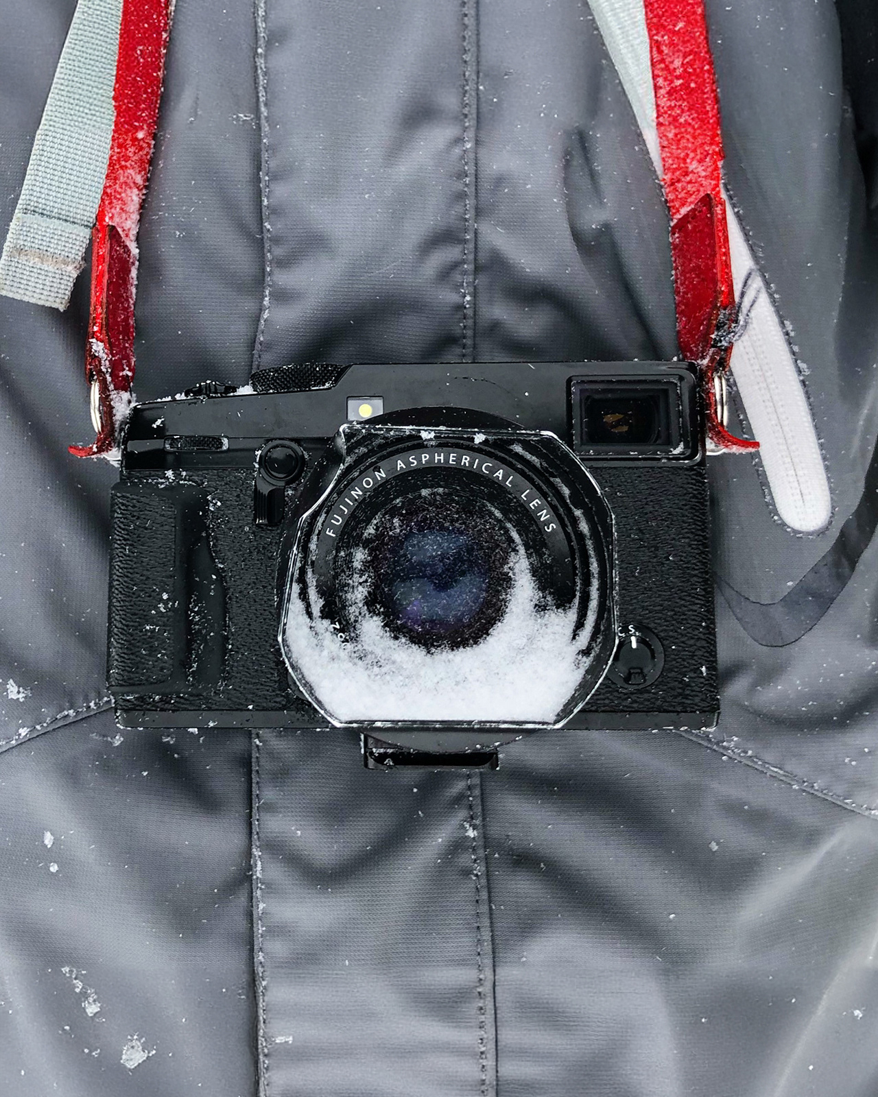 Photo of Fujifilm X-Pro2 and XF35mm f1.4 lens covered in snow