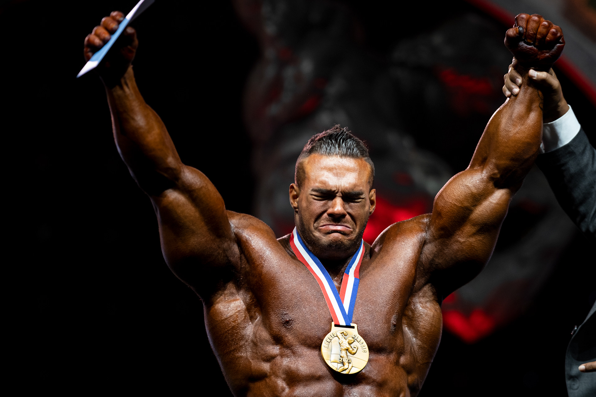 Nick Walker reacts to placing first in the Arnold Classic on September 25, 2021 in Columbus, Ohio, only his second professional competition. Walker earned a bid to the Olympia meet in Orlando, Florida with his victory. "My supporters saw me go two-for-two, now they'll see me go three-for-three at Mr. Olympia," Walker said.