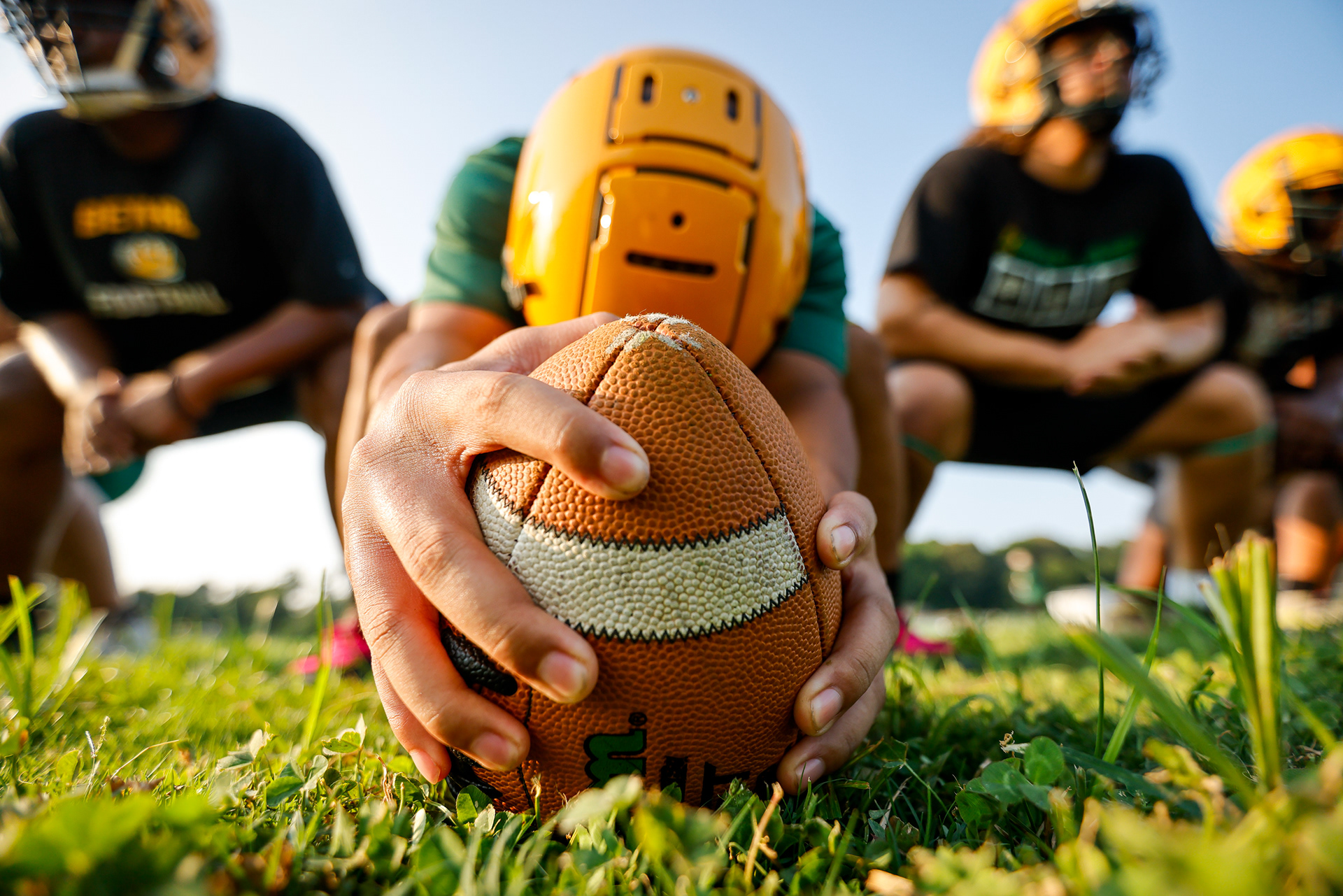 Gavin Perez prepares to snap the ball during field goal drills during the first practice of the season at Bethel High School in Hampton, Virginia, on Aug 1, 2024.