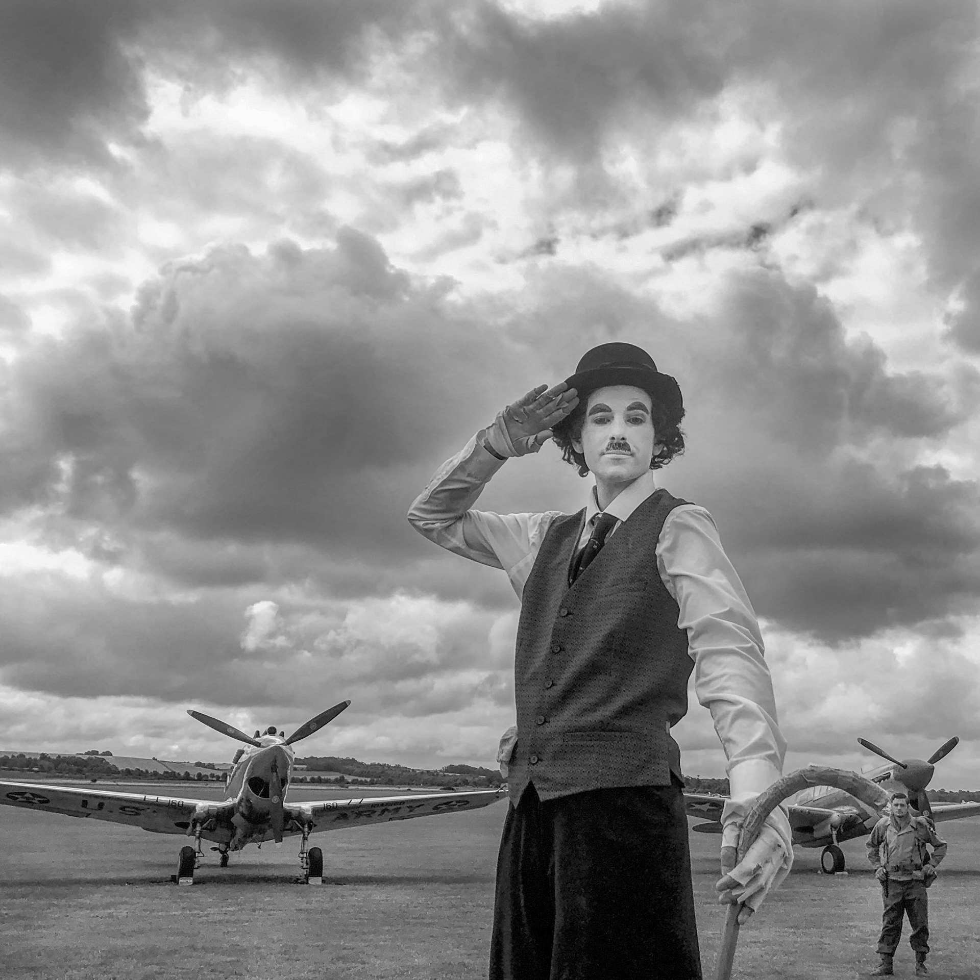 Charlie Chaplin on stilts