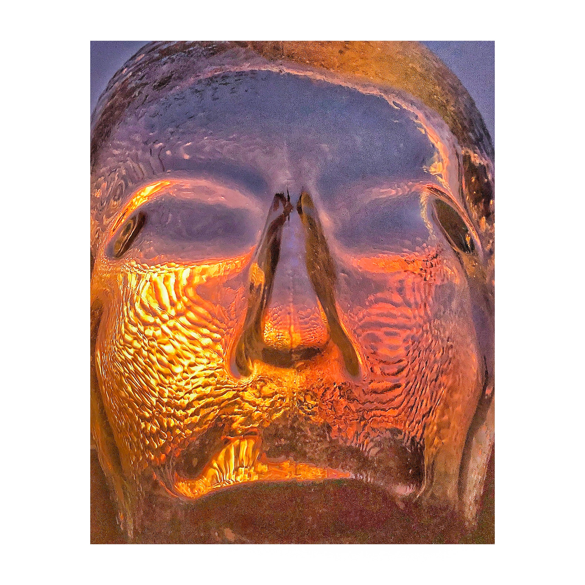 Sunrise through a glass head