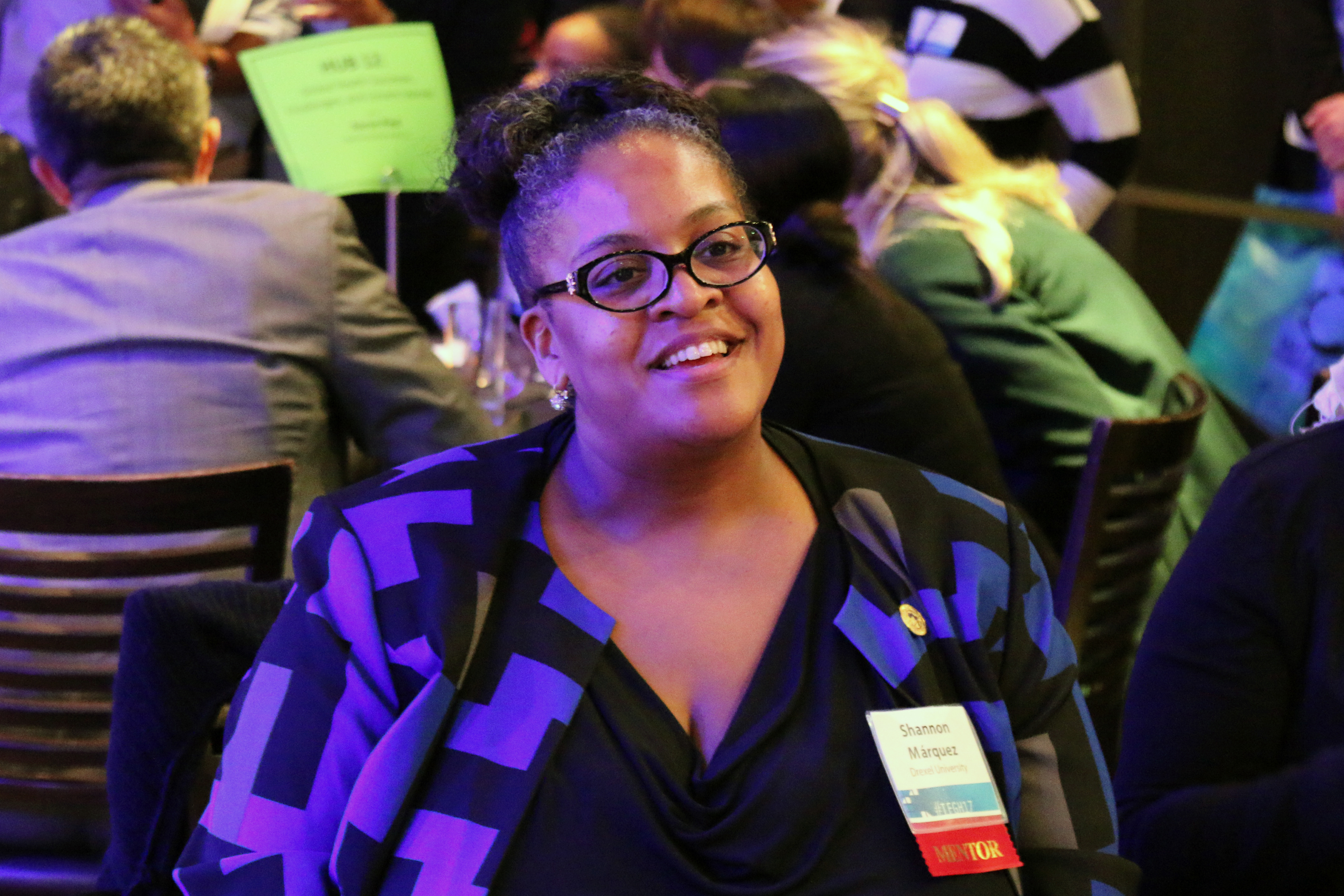 Drexel professor caught enjoying an answer during a discussion and networking round at the TFGH 2017.