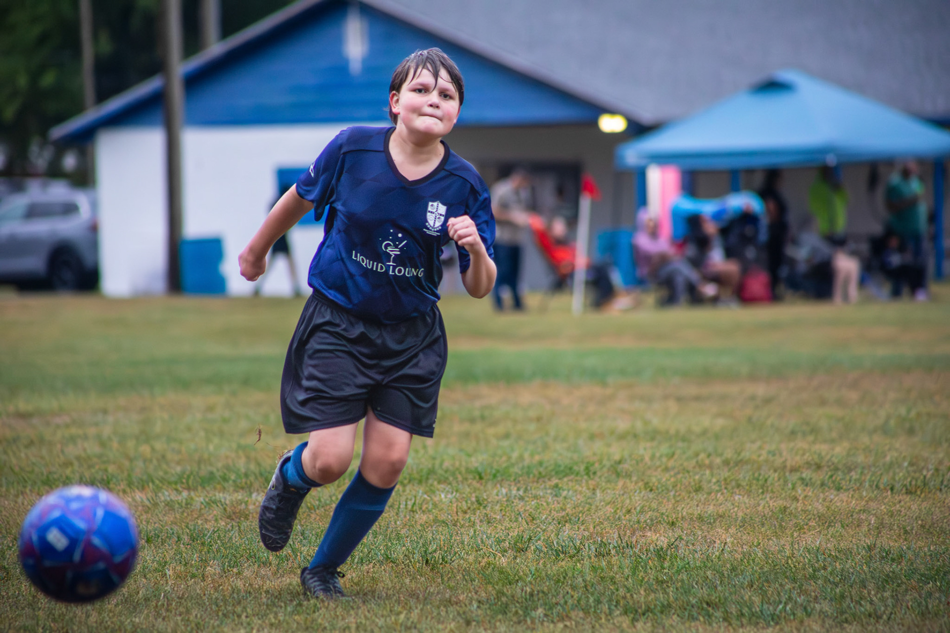 Sideline Run in the Rain. 2025. Digital Photograph.
