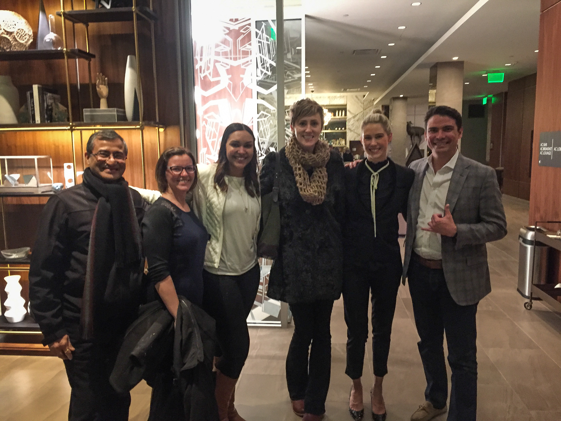 Haresh (L) & Becca (4th from L) with management team