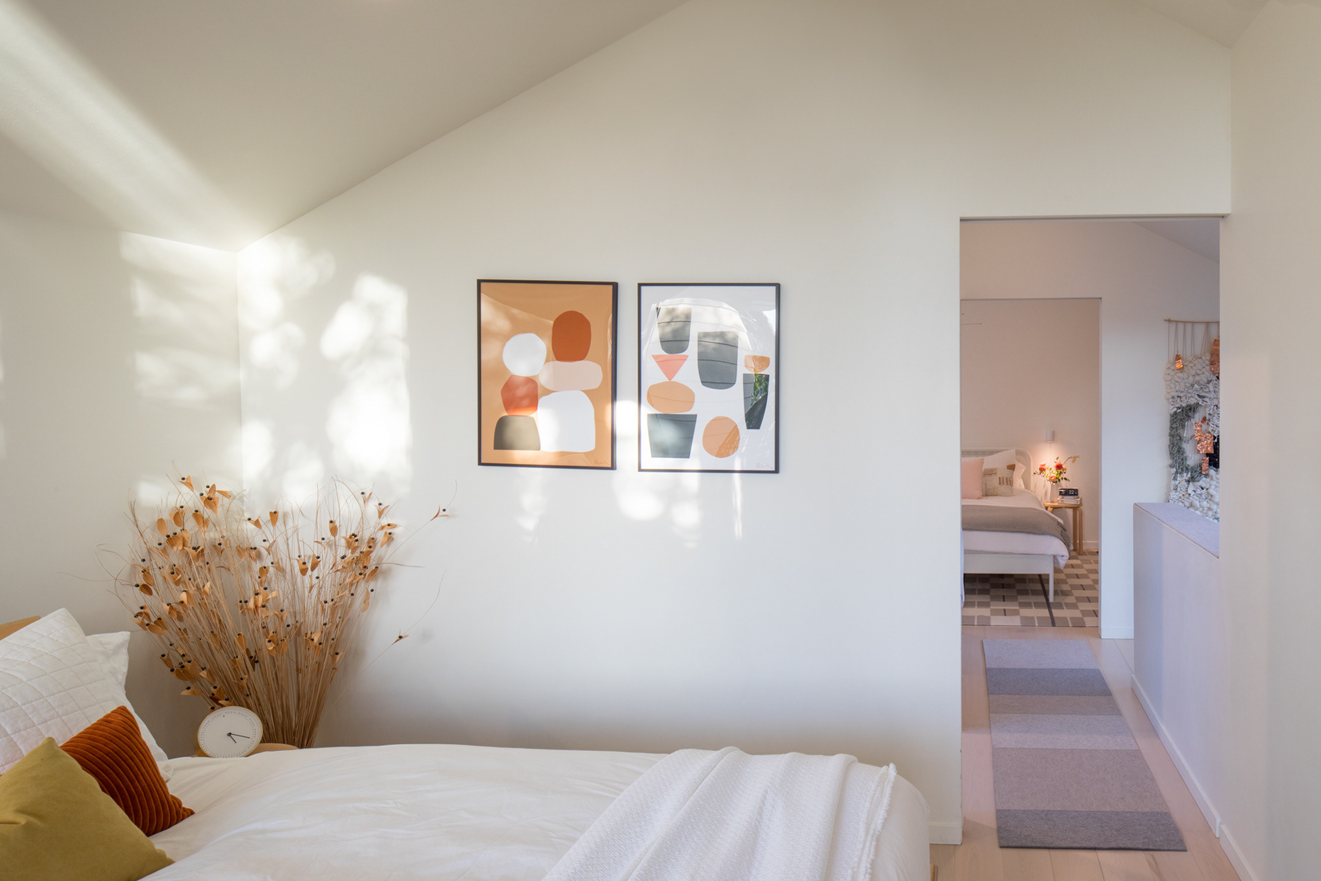 Light spills into the back bedroom.