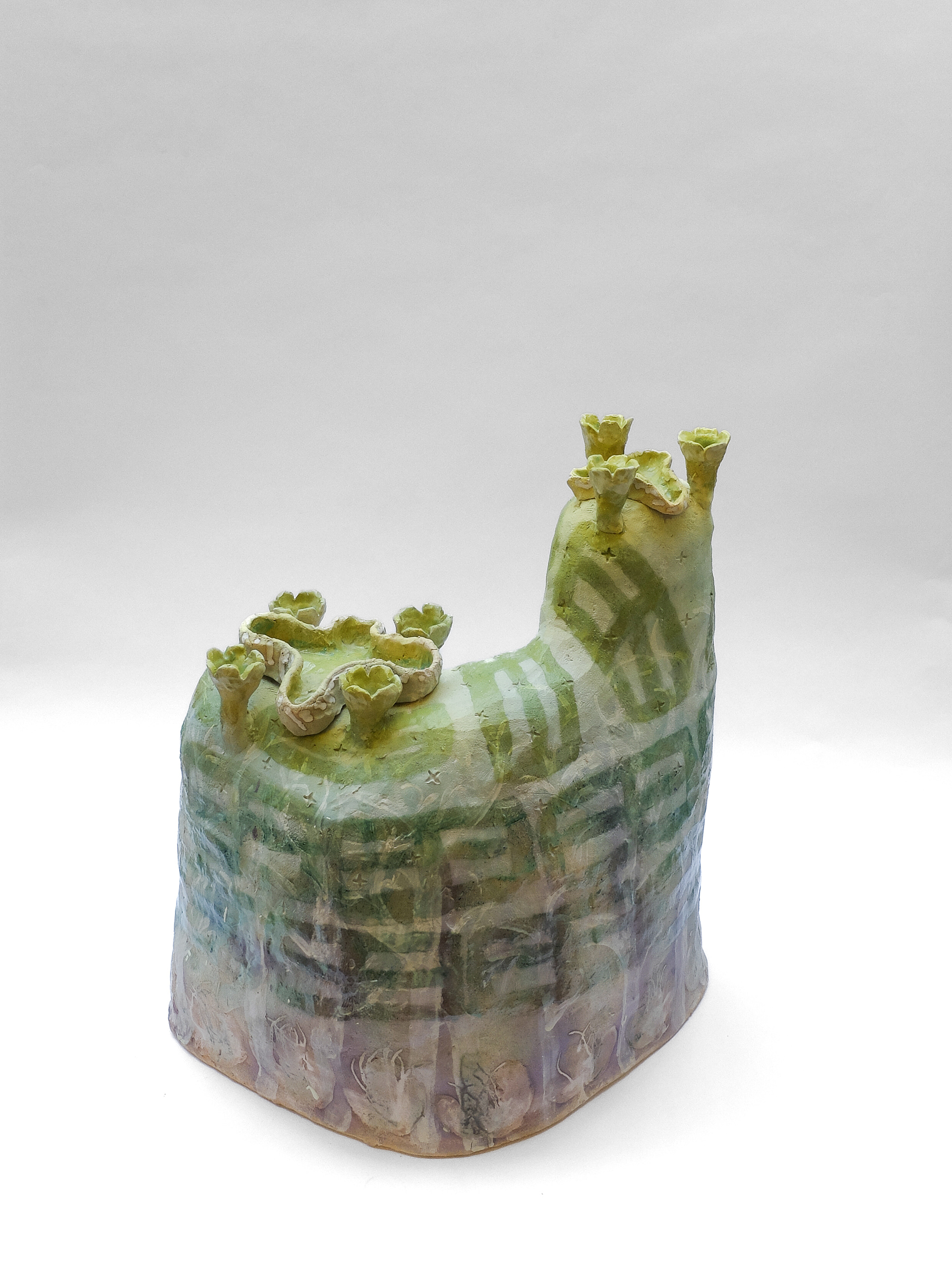 Growing, 2025, stoneware, stains, glaze. 