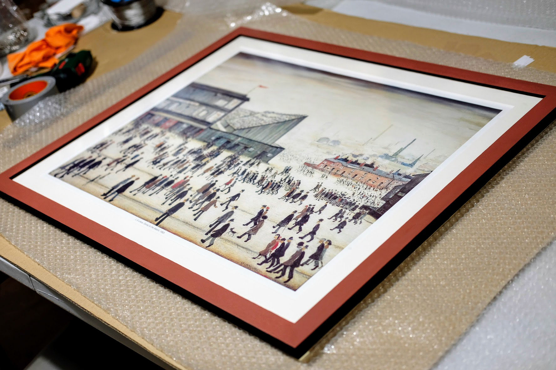 I can offer colour matching, here the frame has been matched to the colours of the Lowry print, with the outside edge painted a matt black.