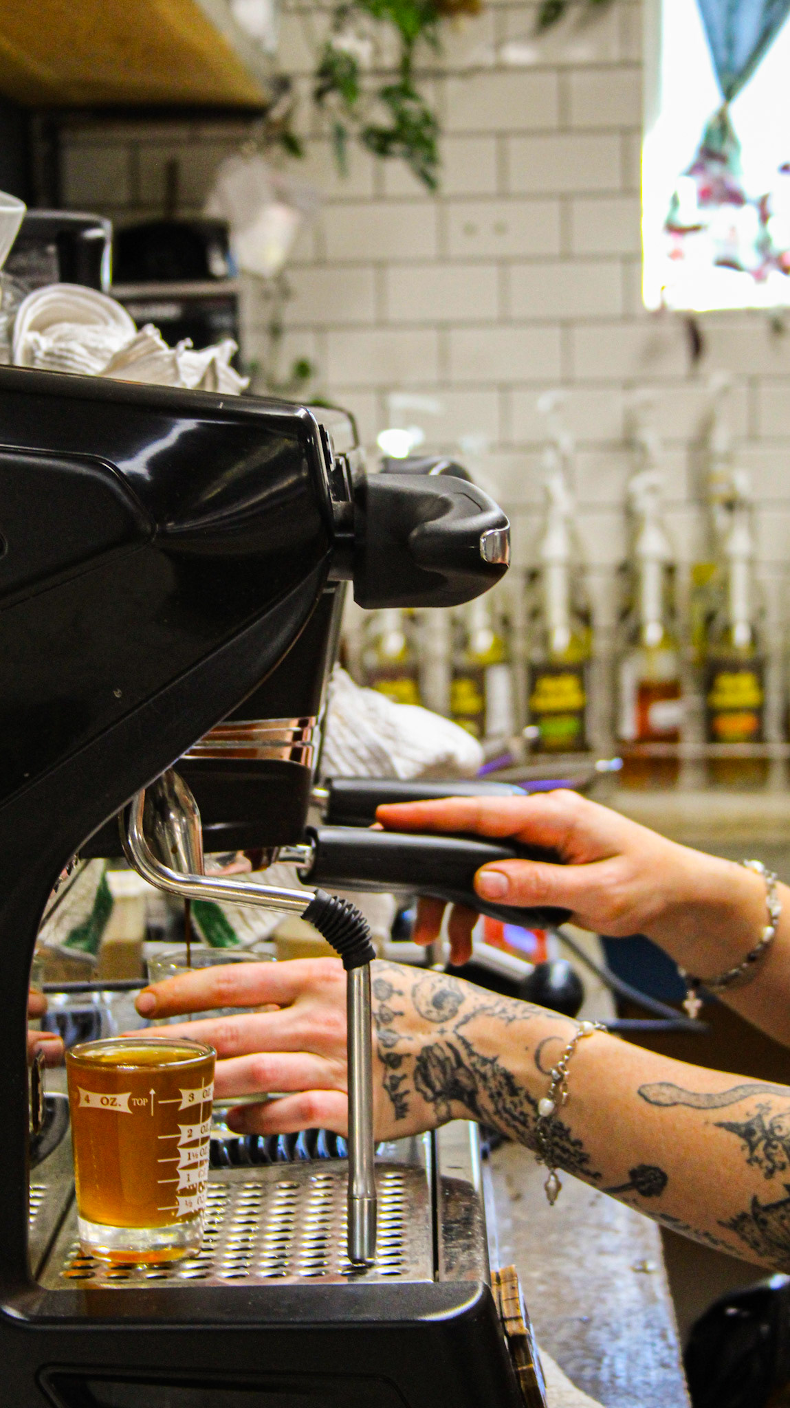 Barista making Espresso at Gaia's Garden Cafe