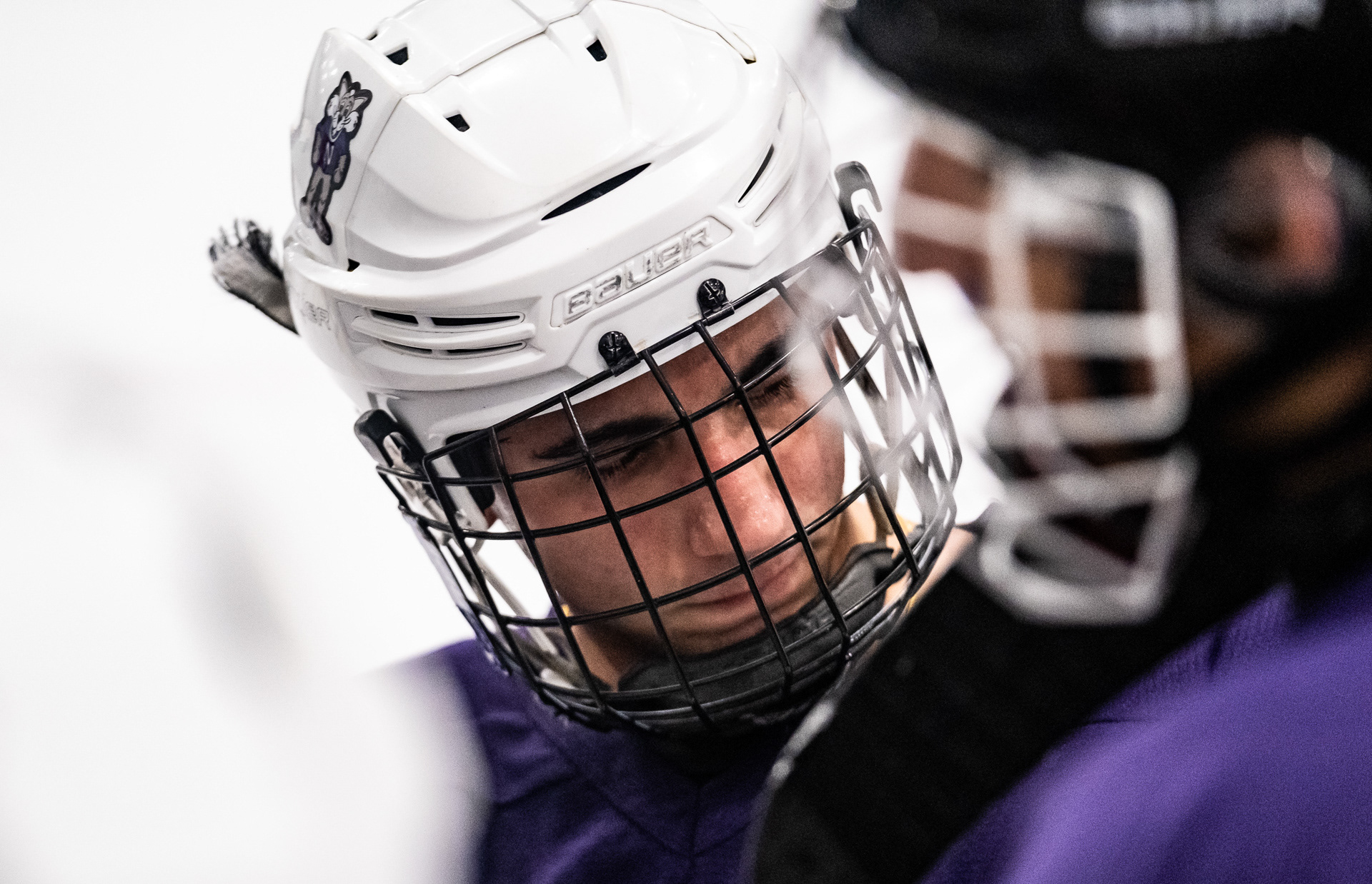 Northwestern club hockey team treasurer Evan Popat huddles with the team at a critical point in their game against Purdue Northwest at Robert Crown Community Center in Evanston, Illinois on October 29, 2022. With less than four minutes left in the final period, Purdue Northwest led Northwestern 4-3. For The Daily Northwestern.