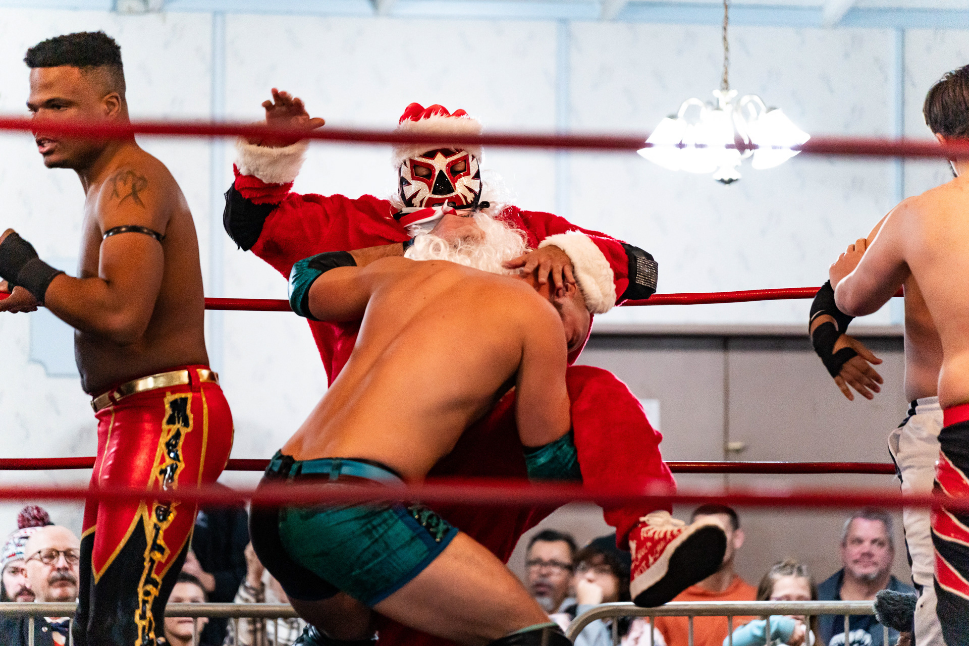 Daniel Cano grapples with another wrestler as Primo Loko in a Chicago Style Wrestling battle royal match at the American Legion Post 974 in Franklin Park, Illinois on November 17, 2023.