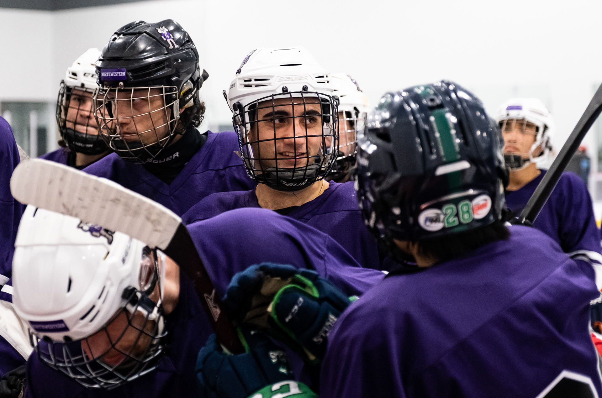 Northwestern club hockey team treasurer Evan Popat smiles during a timeout during Northwestern's game against Purdue Northwest at Robert Crown Community Center in Evanston, Illinois on October 29, 2022. For The Daily Northwestern.