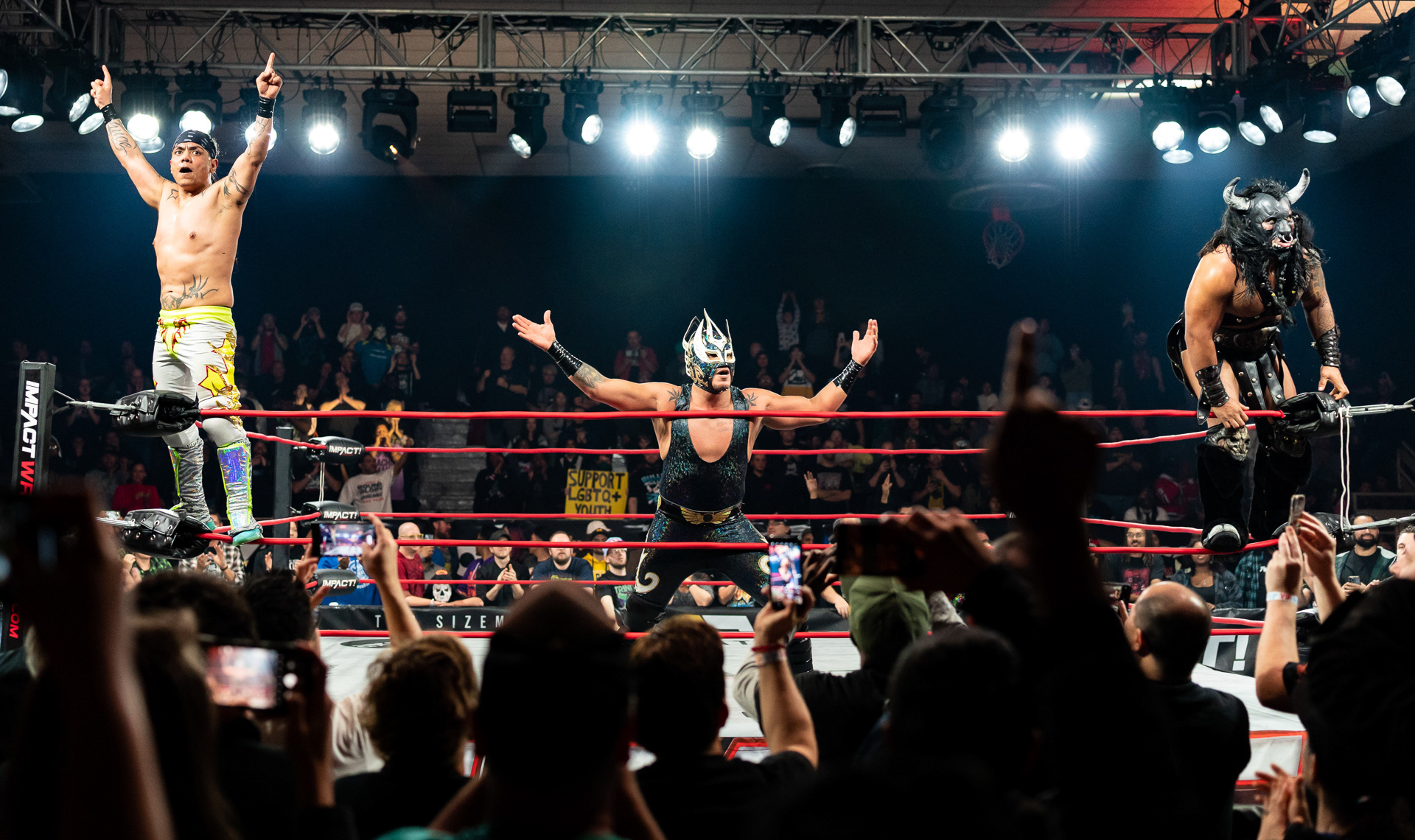 Juventud Guerrera, Laredo Kid and Black Taurus celebrate in the ring after winning their match against The Rascalz during IMPACT Wrestling's Bound for Glory Fallout show at Cicero Stadium in Cicero, Illinois on October 22, 2023.