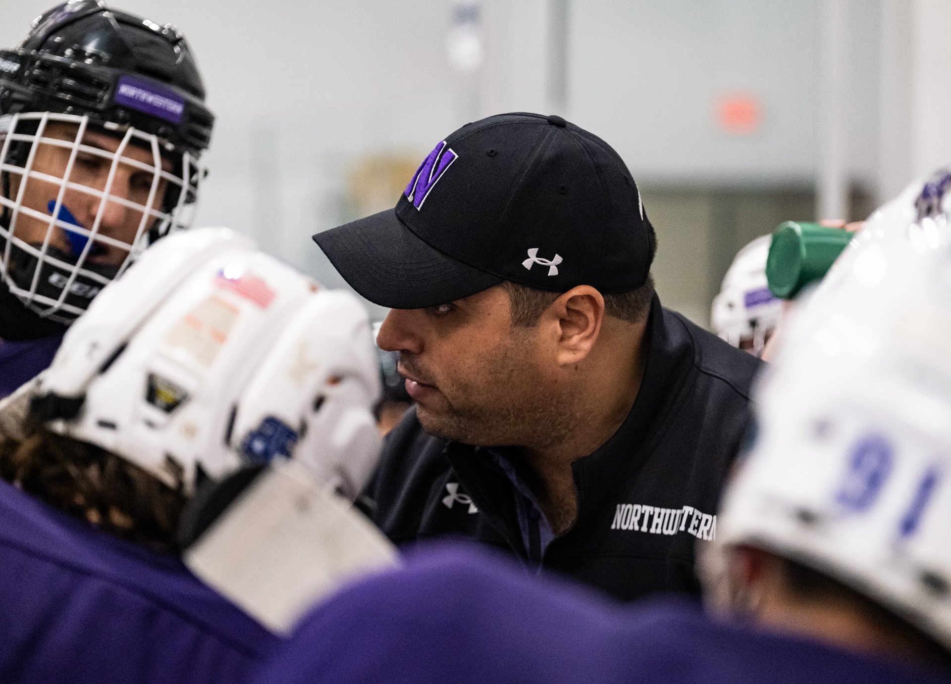 Northwestern club hockey head coach Ari Lifschutz speaks to the team at a critical point in their game against Purdue Northwest at Robert Crown Community Center in Evanston, Illinois on October 29, 2022. With less than four minutes left in the final period, Purdue Northwest led Northwestern 4-3. For The Daily Northwestern.