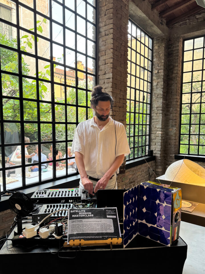 Sending glowing beams of ambient techno at a Venice Biennale space industry event.