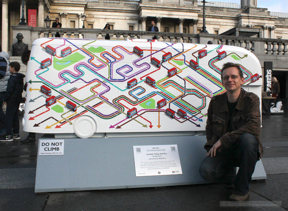 Artist and illustrator Rod Hunt with his illustrated Bus Sculpture for Transport for London