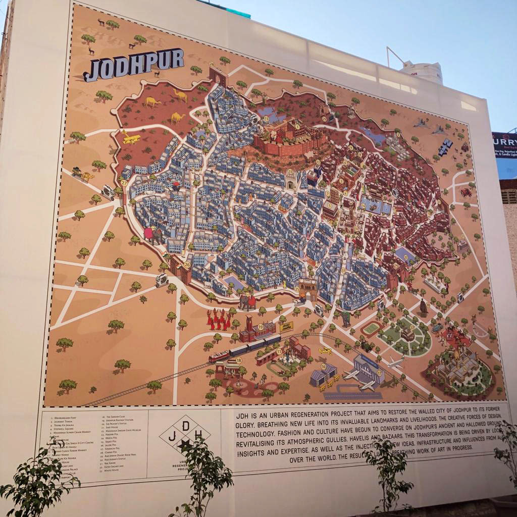 Site-specific public art mural by Illustrated Map Artist Rod Hunt - Jodhpur City Map large environmental illustration installation on display outside Stepwell Square Cafe in Stepwell Square 