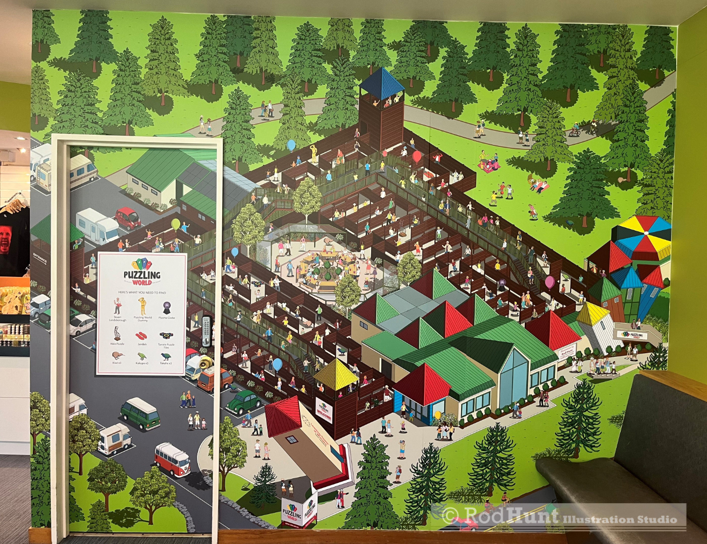 Puzzling World Theme Park illustrated printed mural installation in situ by theme park map maker Rod Hunt for the amusement park