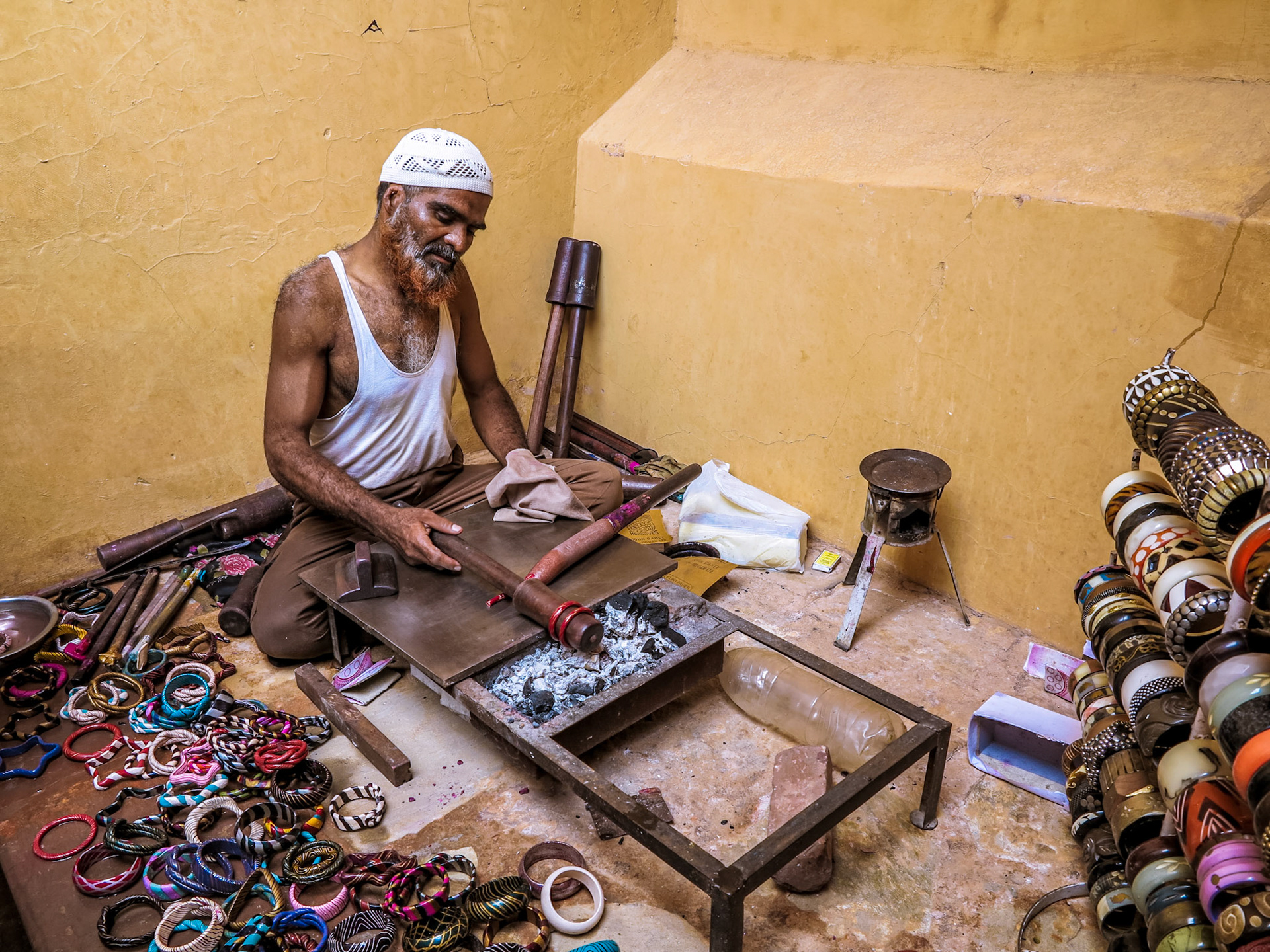 A muslim artist making hand made jewellery