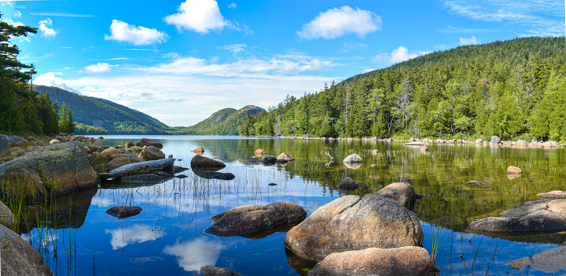 Reflection of the bubble mountains in Jordan Pond, Acadia, Maine