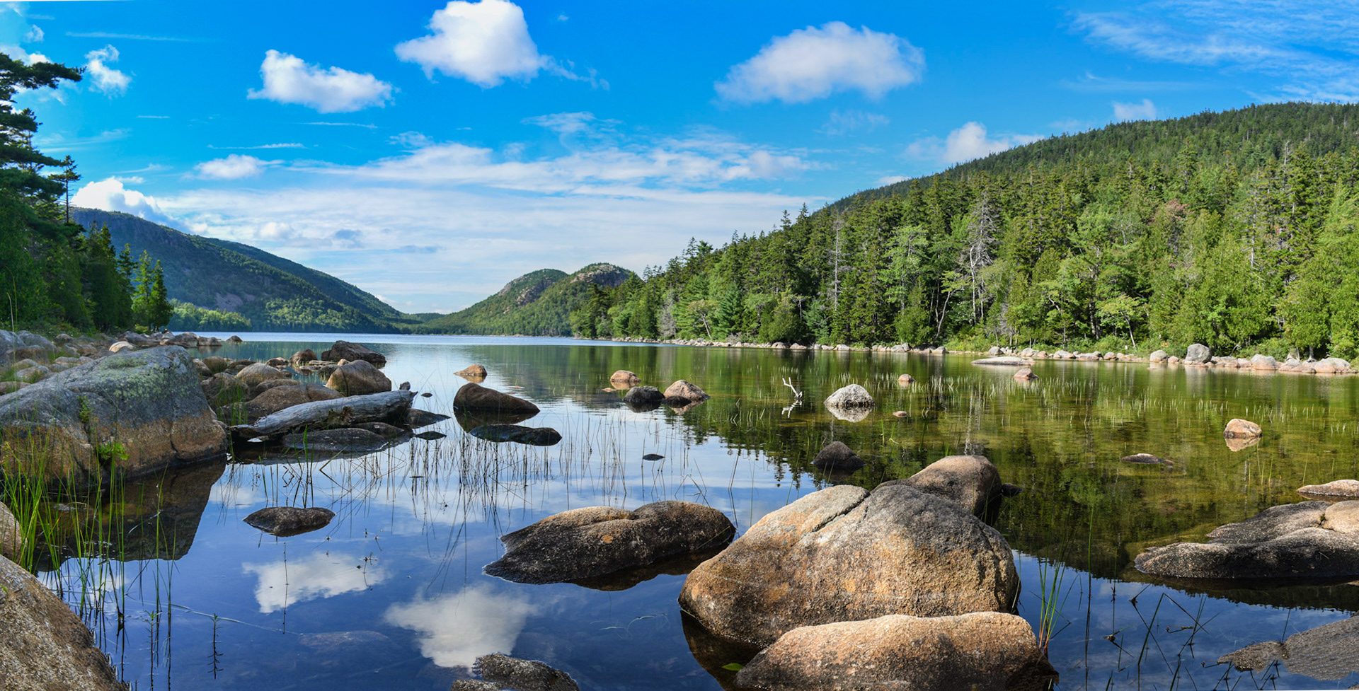 Reflection of the bubble mountains in Jordan Pond, Acadia, Maine