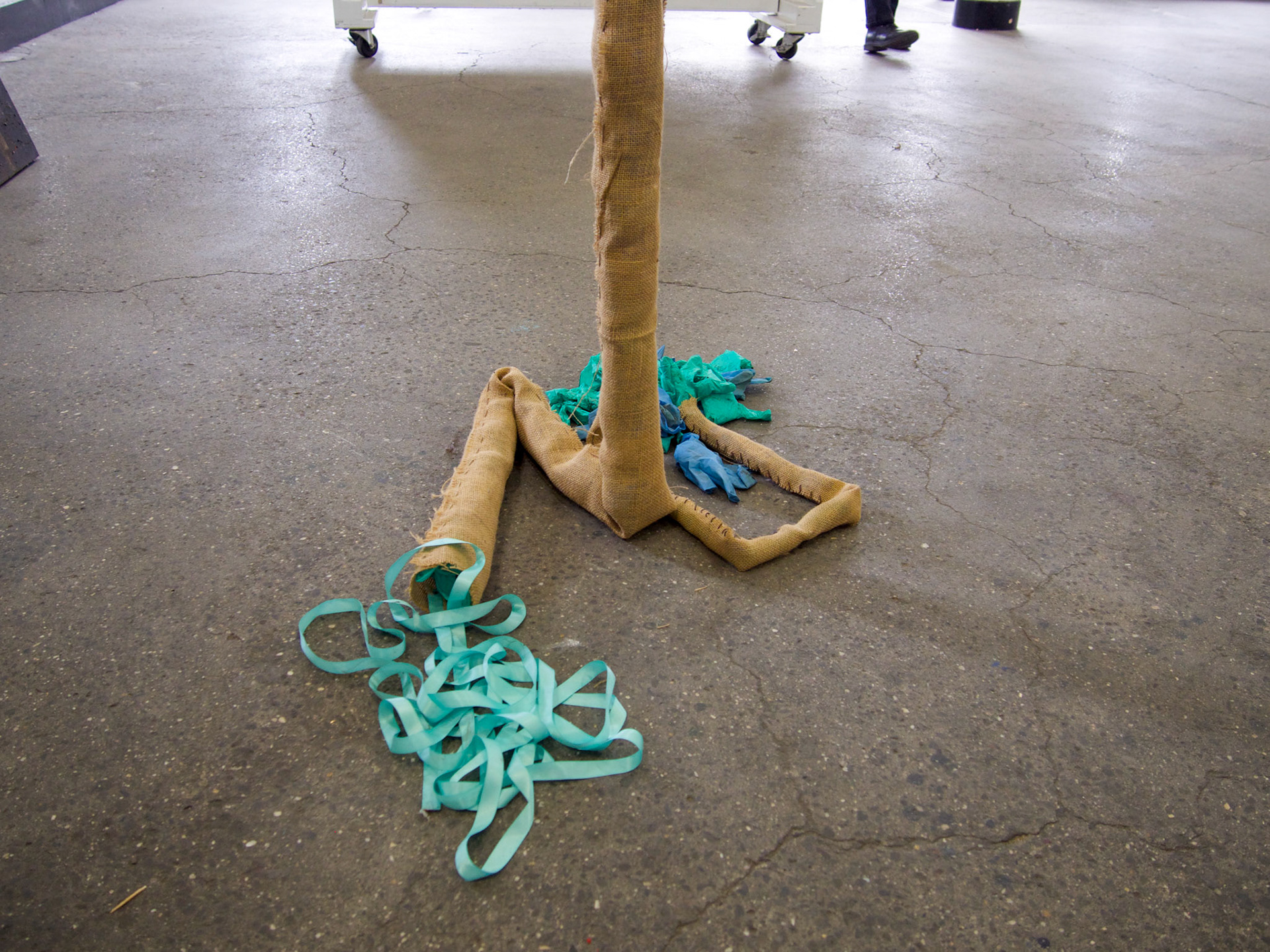 Flax Burlap, 2021 - spring 2022s’ used rubber gloves and Tiffany ble ribon.  27’  long a life size digestive tract.