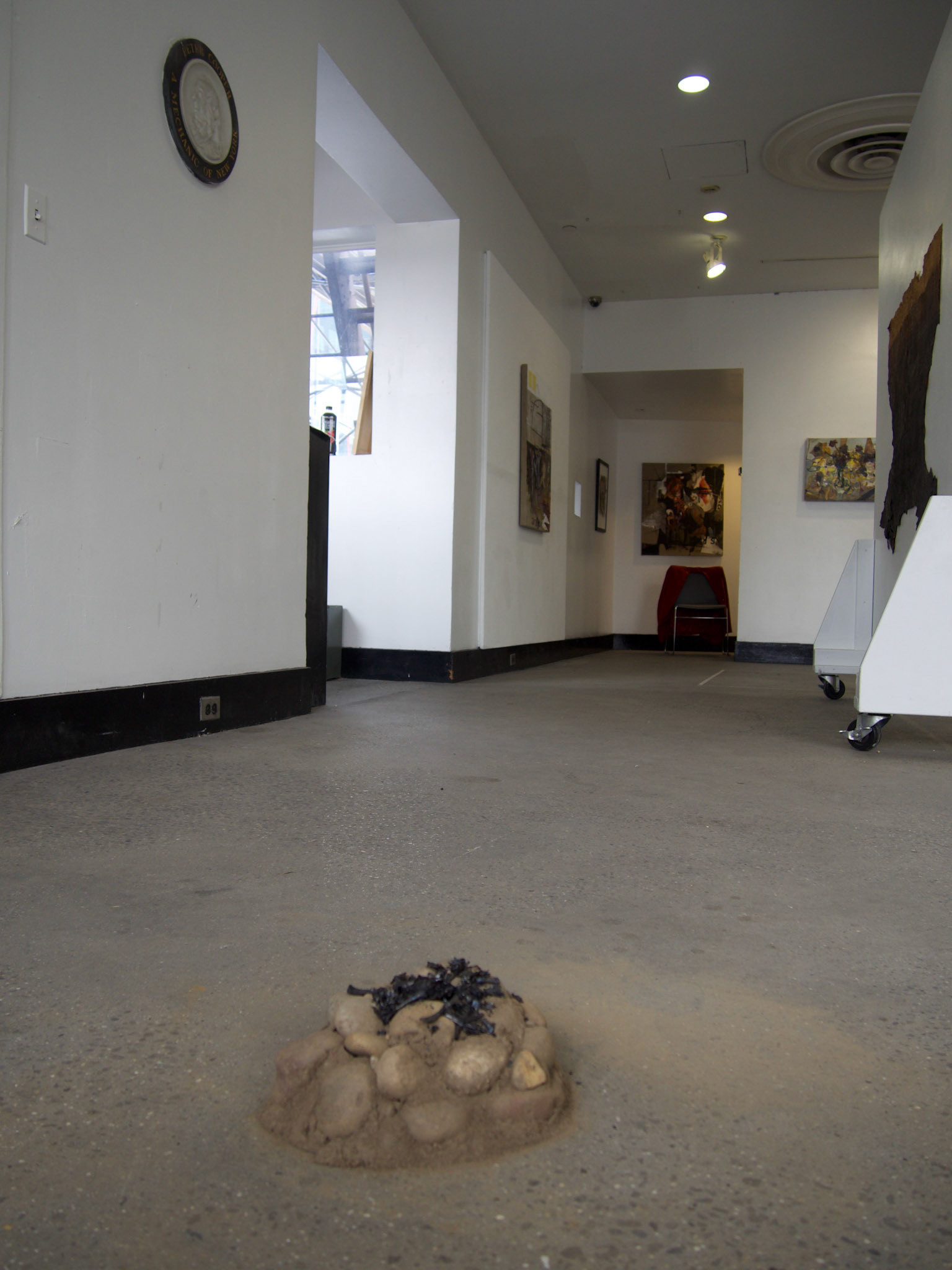 Alter Brooklyn earth, stones never tooled, ash, jaw and all other bones