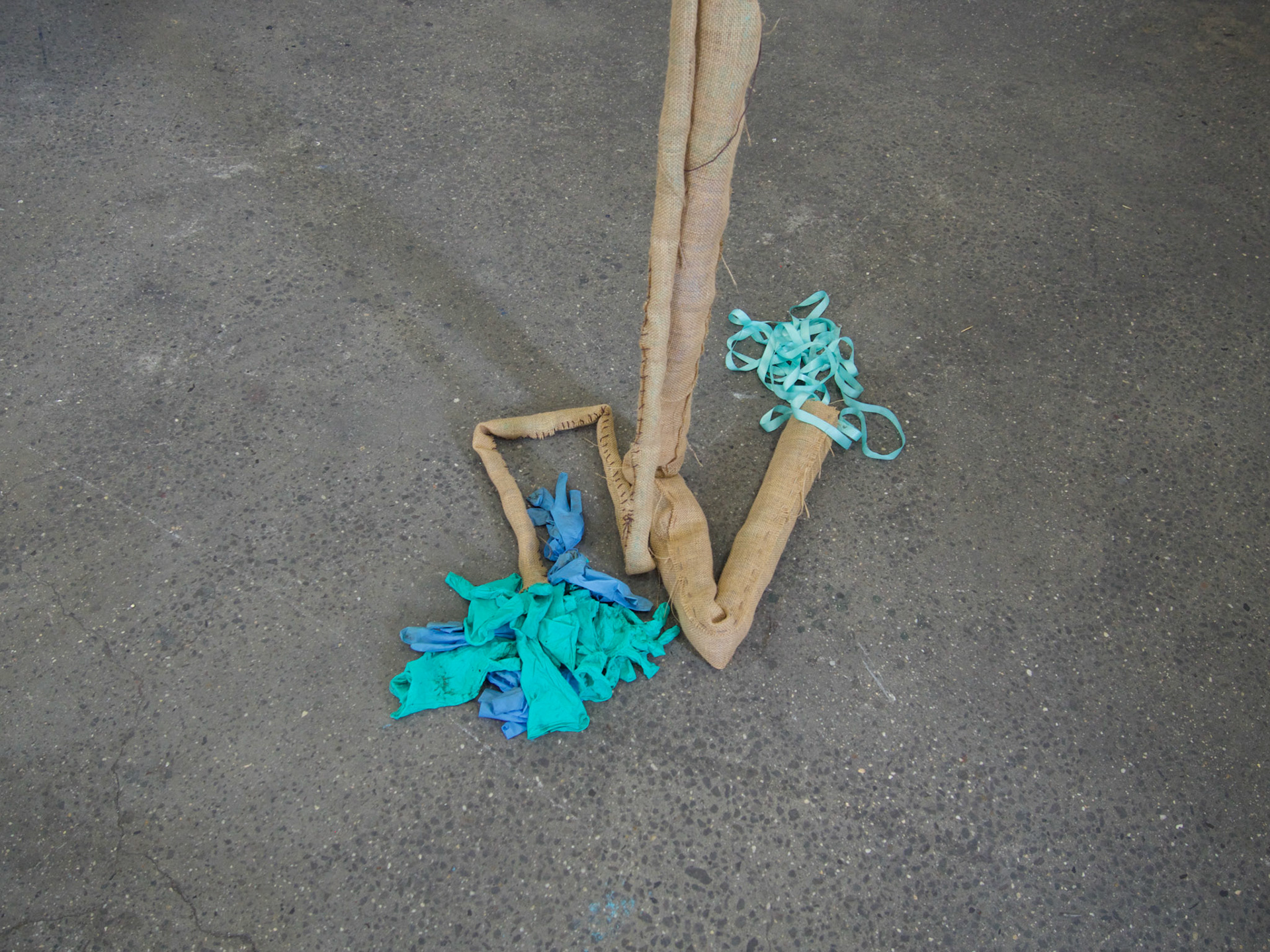 Flax Burlap, 2021 - spring 2022s’ used rubber gloves and Tiffany ble ribon.  27’  long a life size digestive tract.