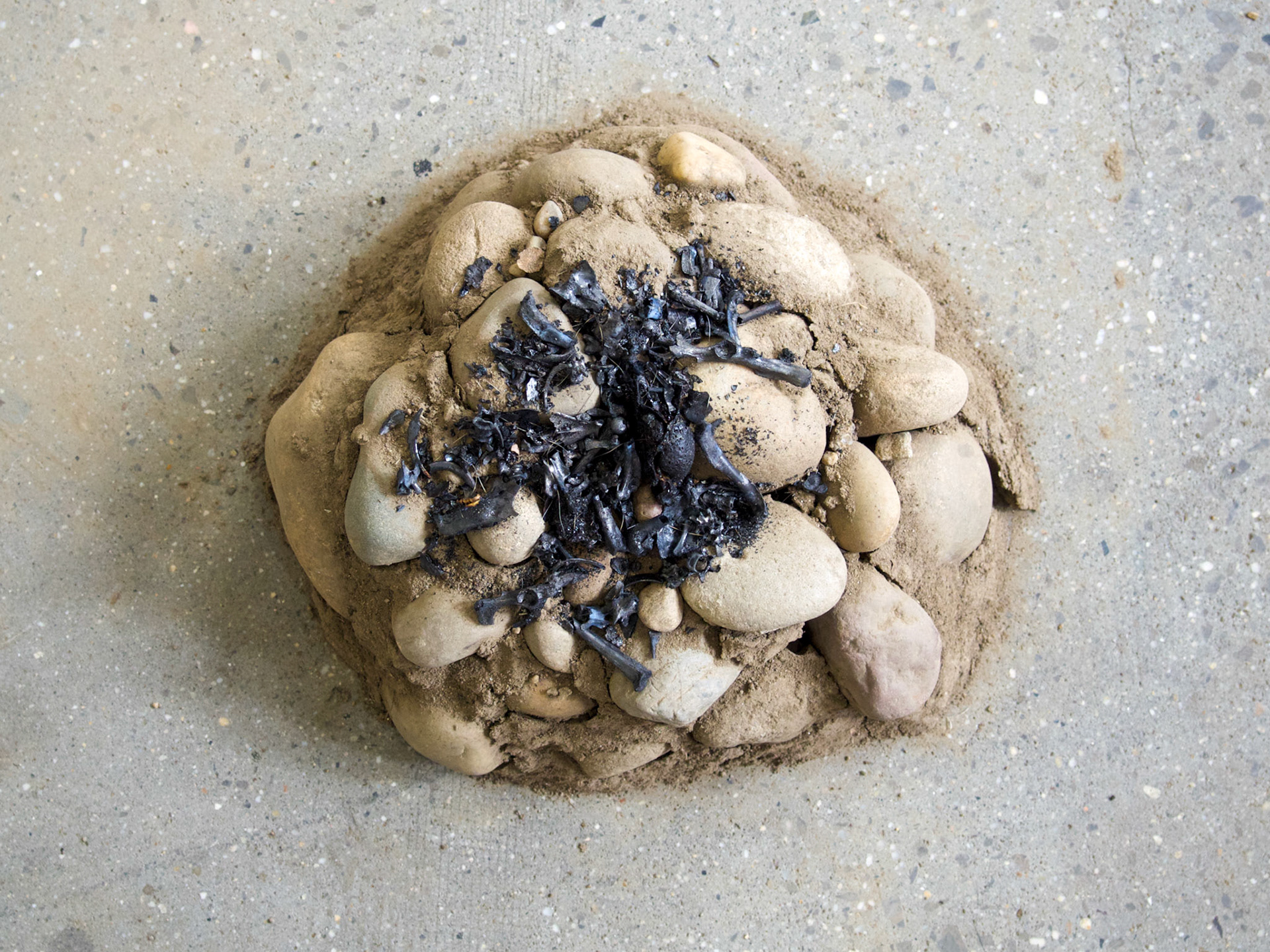 Alter Brooklyn earth, stones never tooled, ash, jaw and all other bones