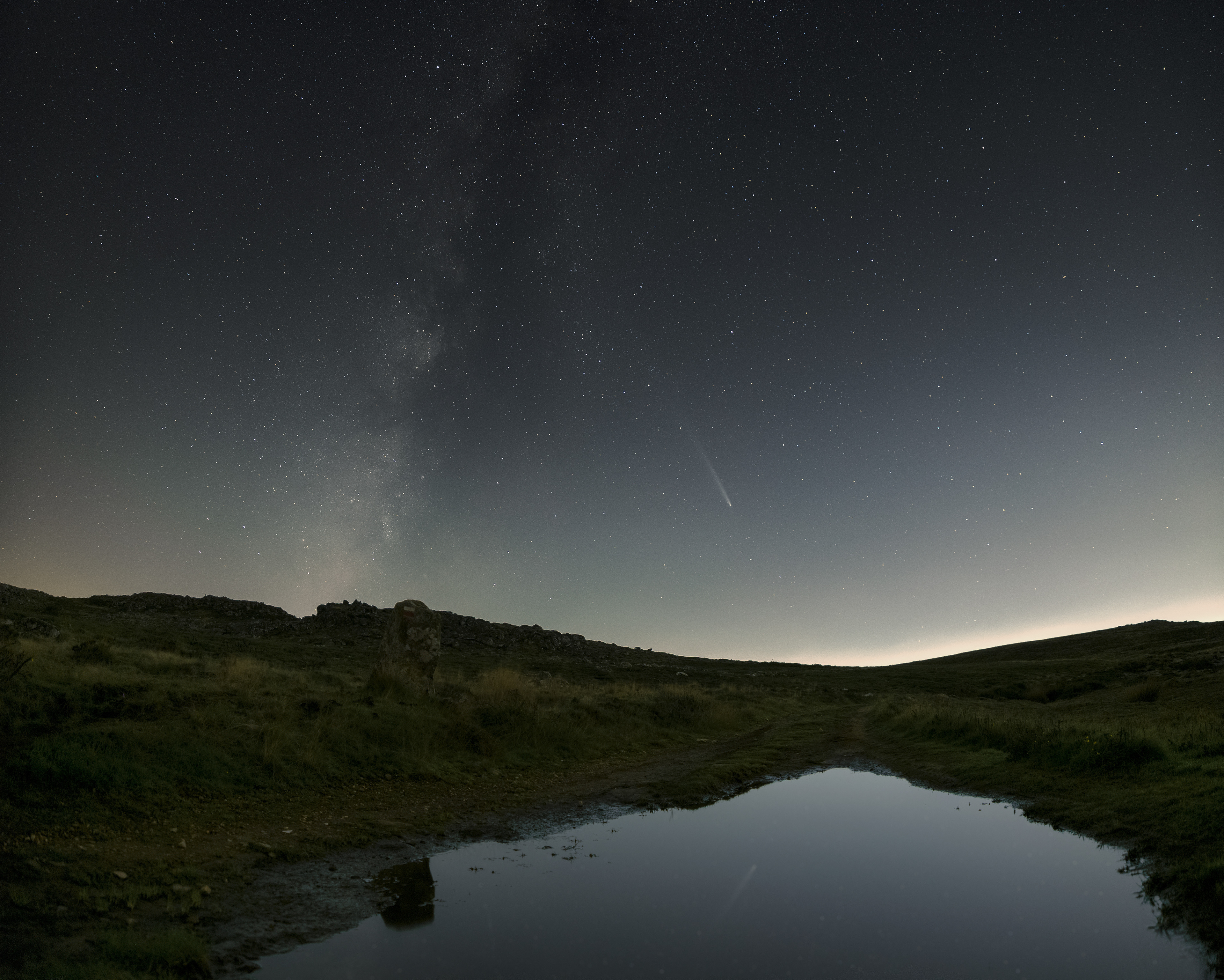 Comet c/2024 G3 Atlas still visible through heavy light pollution, reflected on water - Serra da Freita