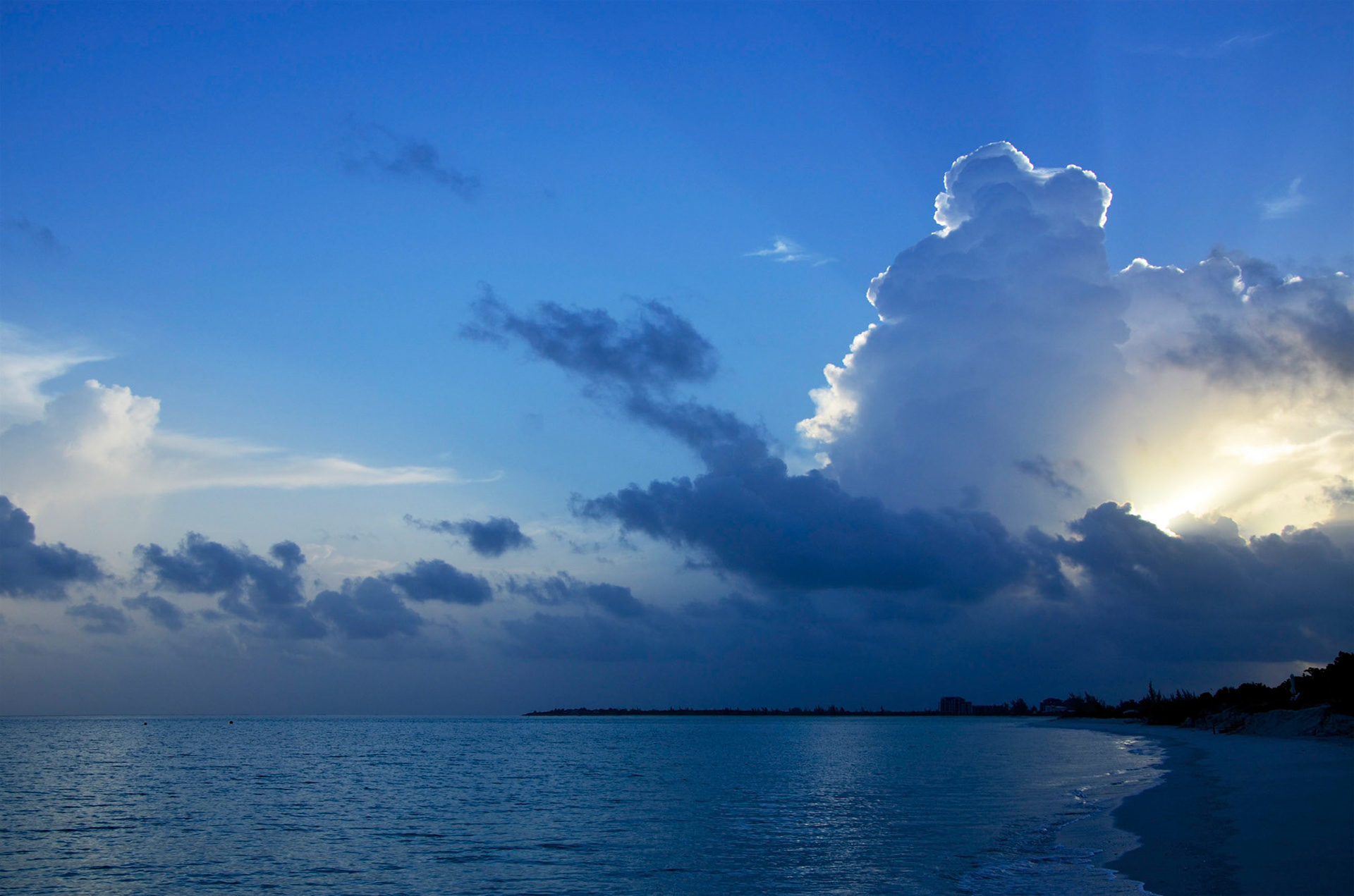 Sunrise breaking through clouds at Parrot Cay, Turks &amp; Caicos