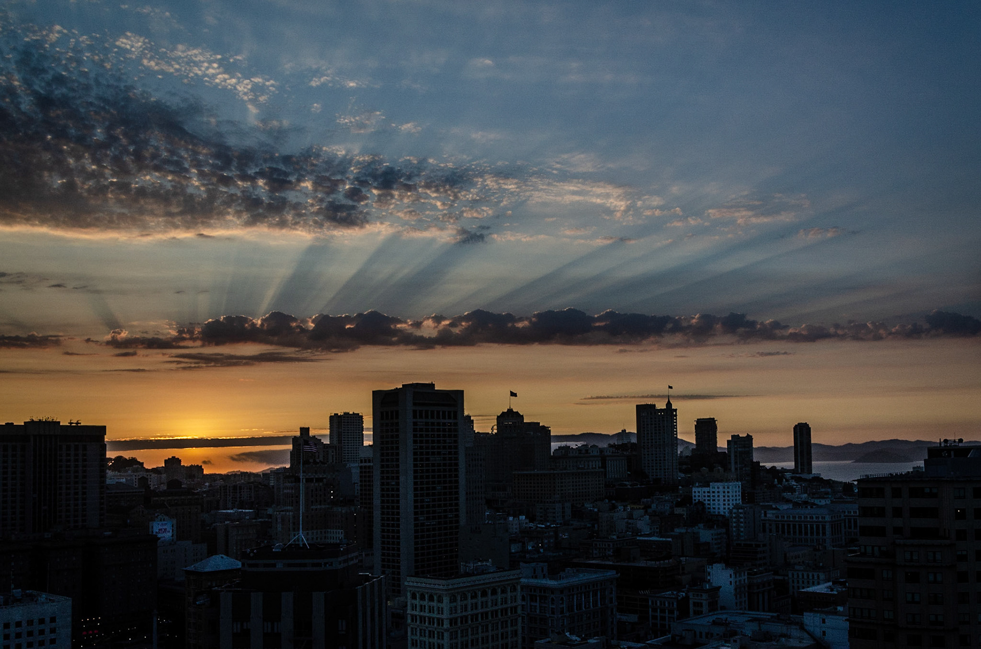 Dramatic clouds and rays of sun in San Francisco