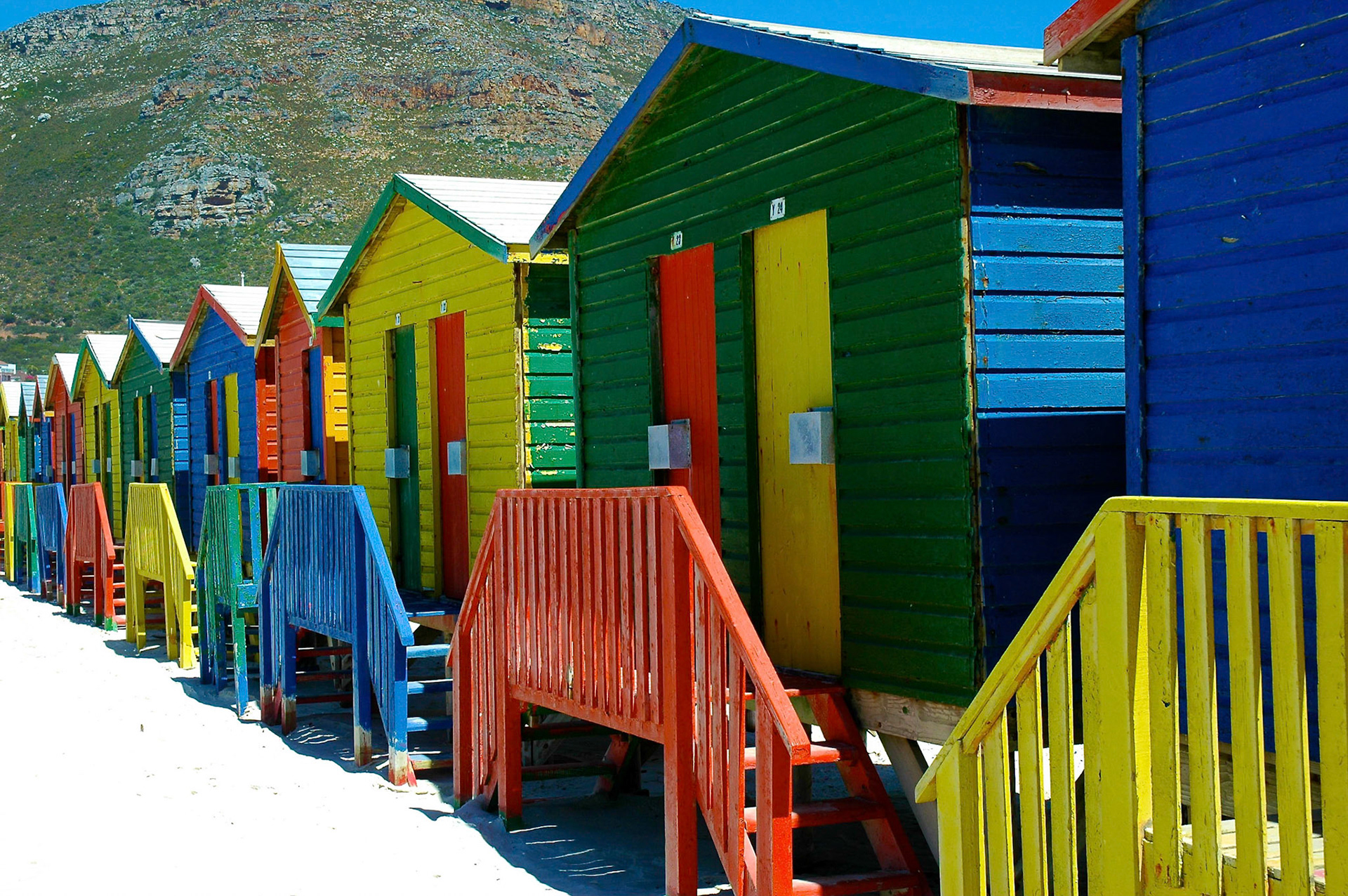 Colorful beach huts on Muizenberg beach near Cape Town