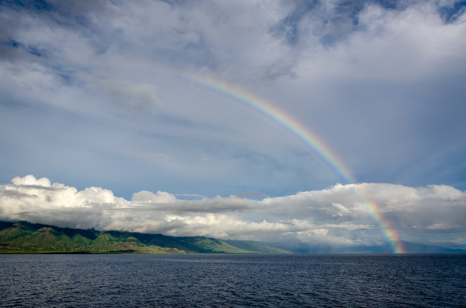 Rainbow over the sea near Lanai, Hawaii