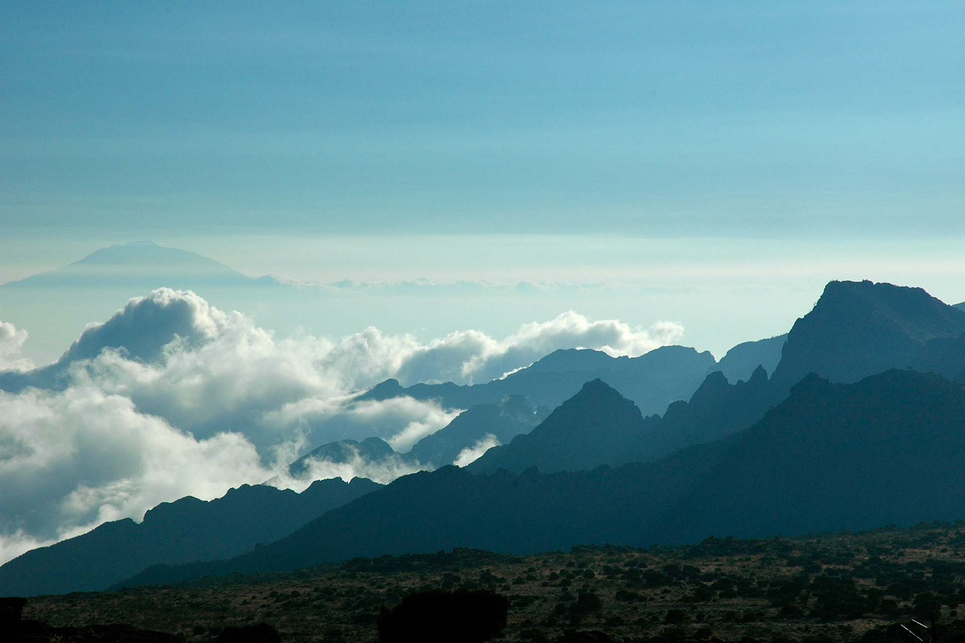 Mountains and clouds from the Lemosho Route camp 3, Kilimanjaro, Tanzania